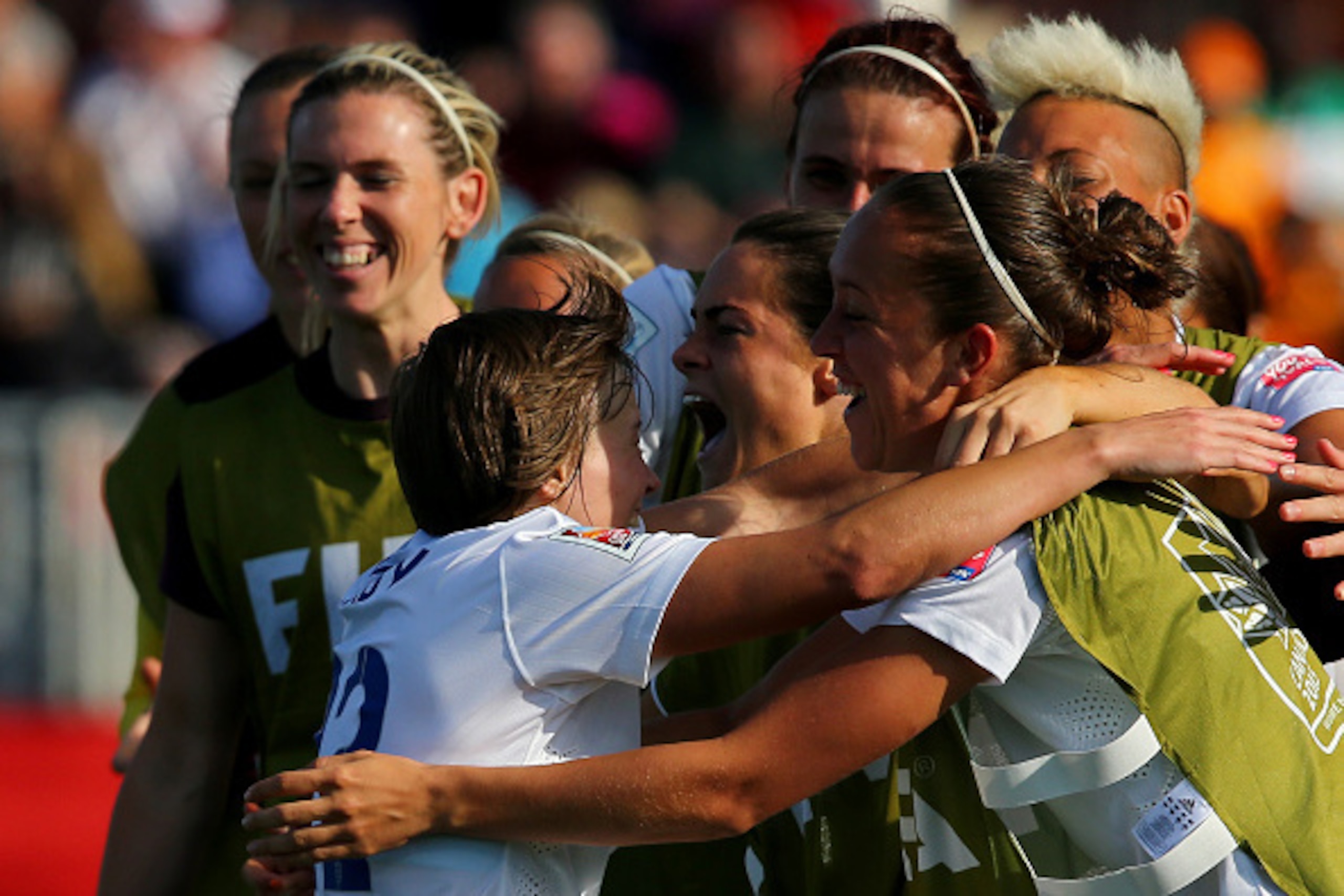 MONCTON, NB - JUNE 13:  Fran Kirby #22 of England is congratulated by teamamte Jo Potter #17 after Kirby scored in the second half against Mexico during the FIFA Women's World Cup 2015 Group F match at Moncton Stadium on June 13, 2015 in Moncton, Canada. 
