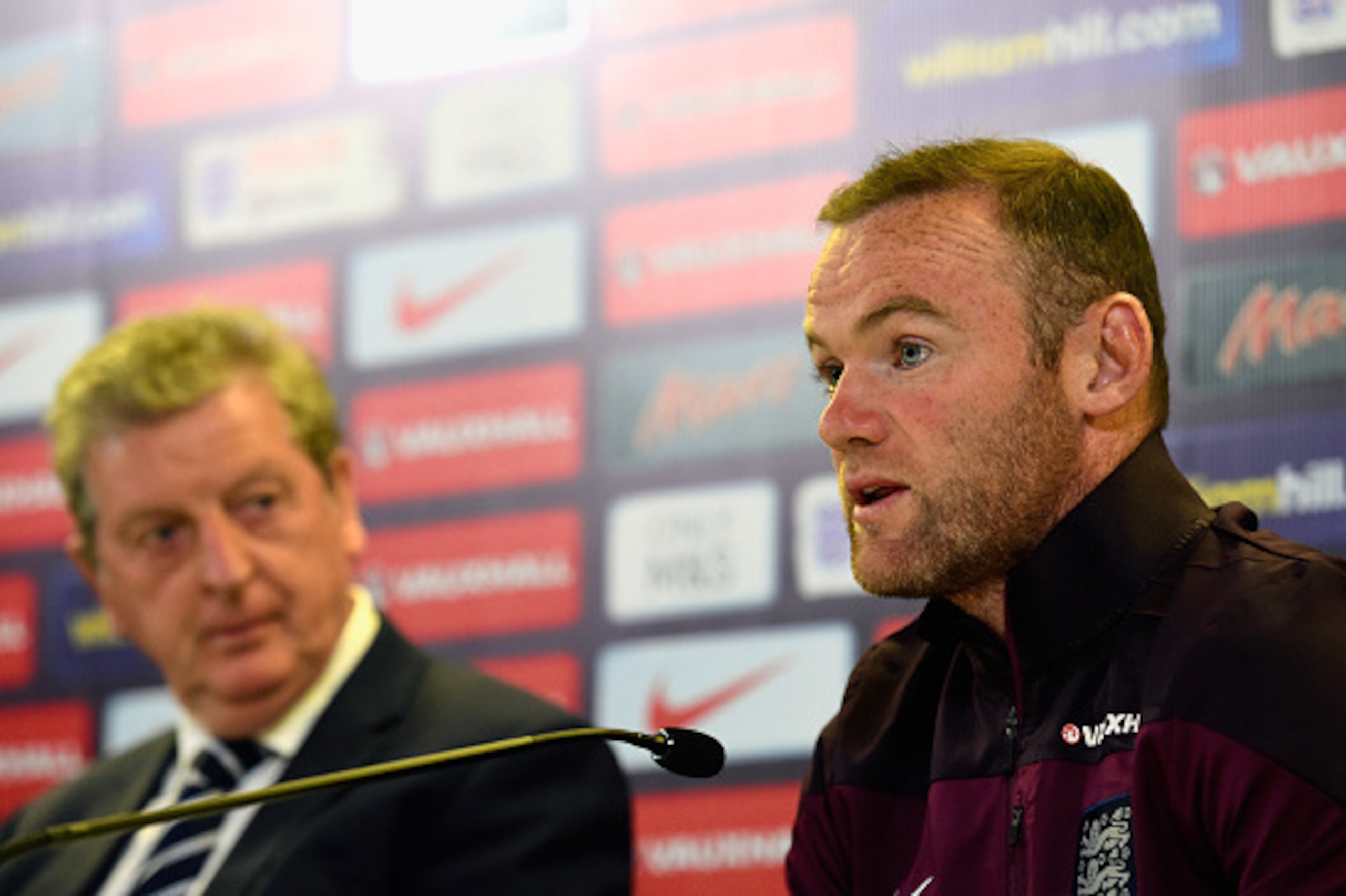 DUBLIN, IRELAND - JUNE 06: England coach Roy Hodgson (l) and captain Wayne Rooney face the press ahead of Sunday's friendly internmational against the Republic of Ireland at Aviva Stadium on June 6, 2015 in Dublin, Ireland. (Photo by Stu Forster/Getty I DUBLIN, IRELAND - JUNE 06: England coach Roy Hodgson (l) and captain Wayne Rooney face the press ahead of Sunday's friendly internmational against the Republic of Ireland at Aviva Stadium on June 6, 2015 in Dublin, Ireland. (Photo by Stu Forster/Getty I