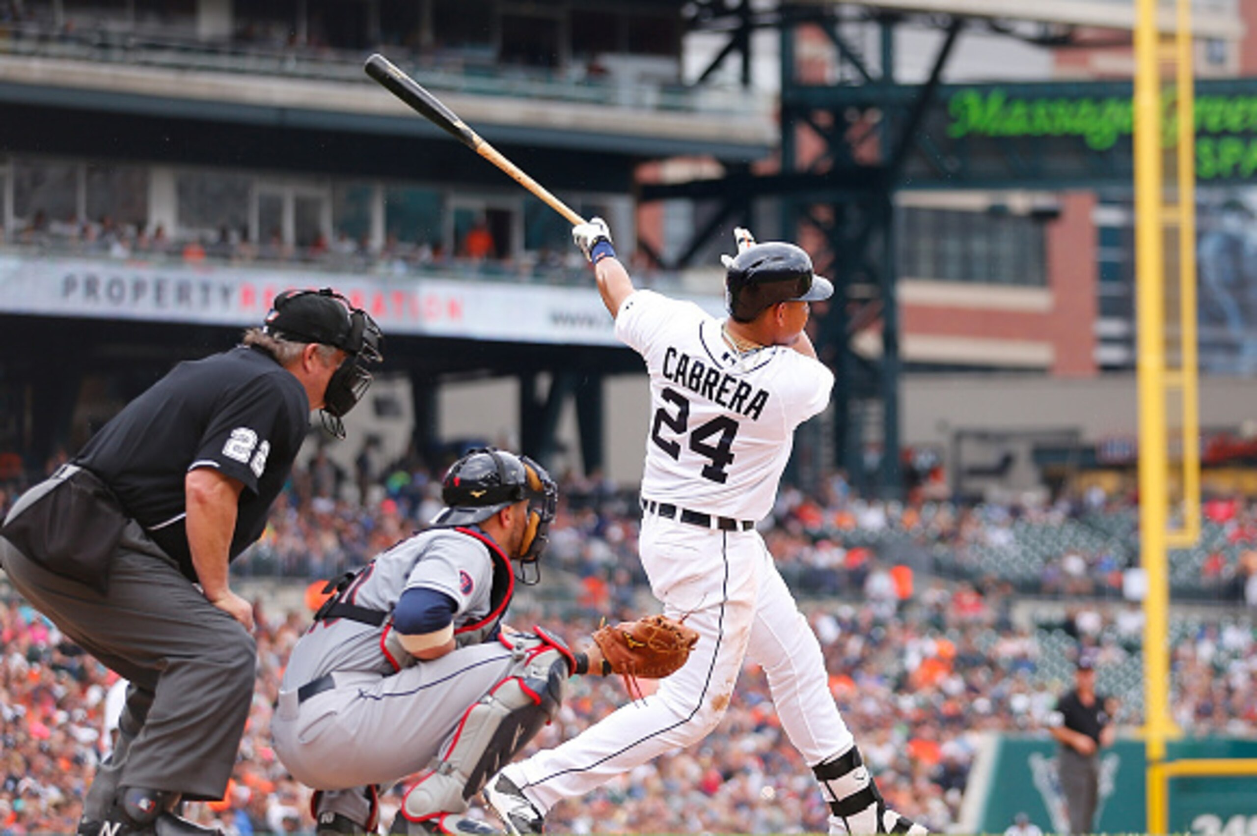 DETROIT, MI - JUNE 14: Miguel Cabrera #24 of the Detroit Tigers hits a solo home run to centerfield in the fourth inning of the game against the Cleveland Indians on June 14, 2015 at Comerica Park in Detroit, Michigan. (Photo by Leon Halip/Getty Images)