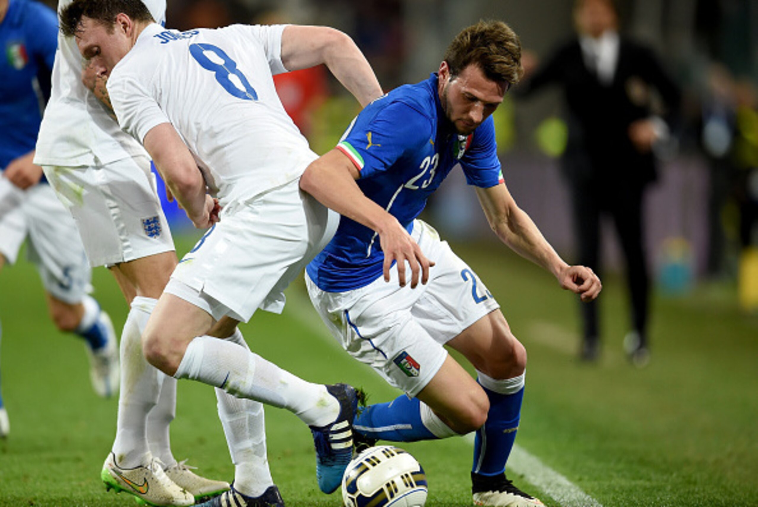 TURIN, ITALY - MARCH 31:  Franco Vazquez of Italy and  Phil Jones of England #8 compete for the ball during the international friendly match between Italy and England at the Juventus Stadium on March 31, 2015 in Turin, Italy.  (Photo by Claudio Villa/Gett
