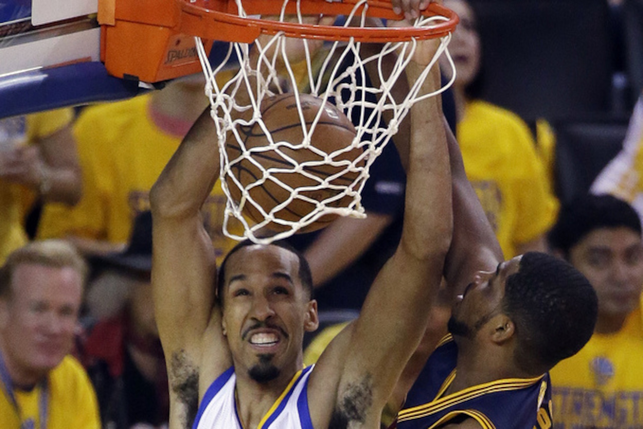 Shaun Livingston gets the putback dunk over Tristan Thompson.