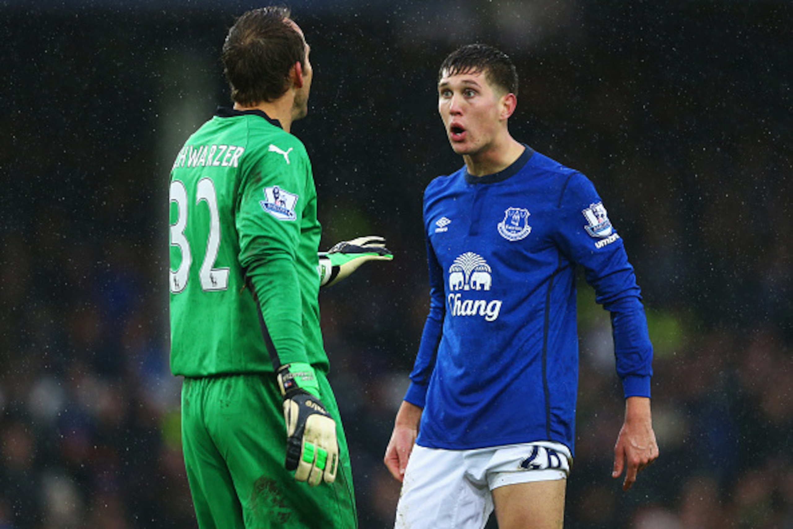 LIVERPOOL, ENGLAND - FEBRUARY 22:  Mark Schwarzer of Leicester City and John Stones of Everton in discussion during the Barclays Premier League match between Everton and Leicester City at Goodison Park on February 22, 2015 in Liverpool, England.  (Photo b