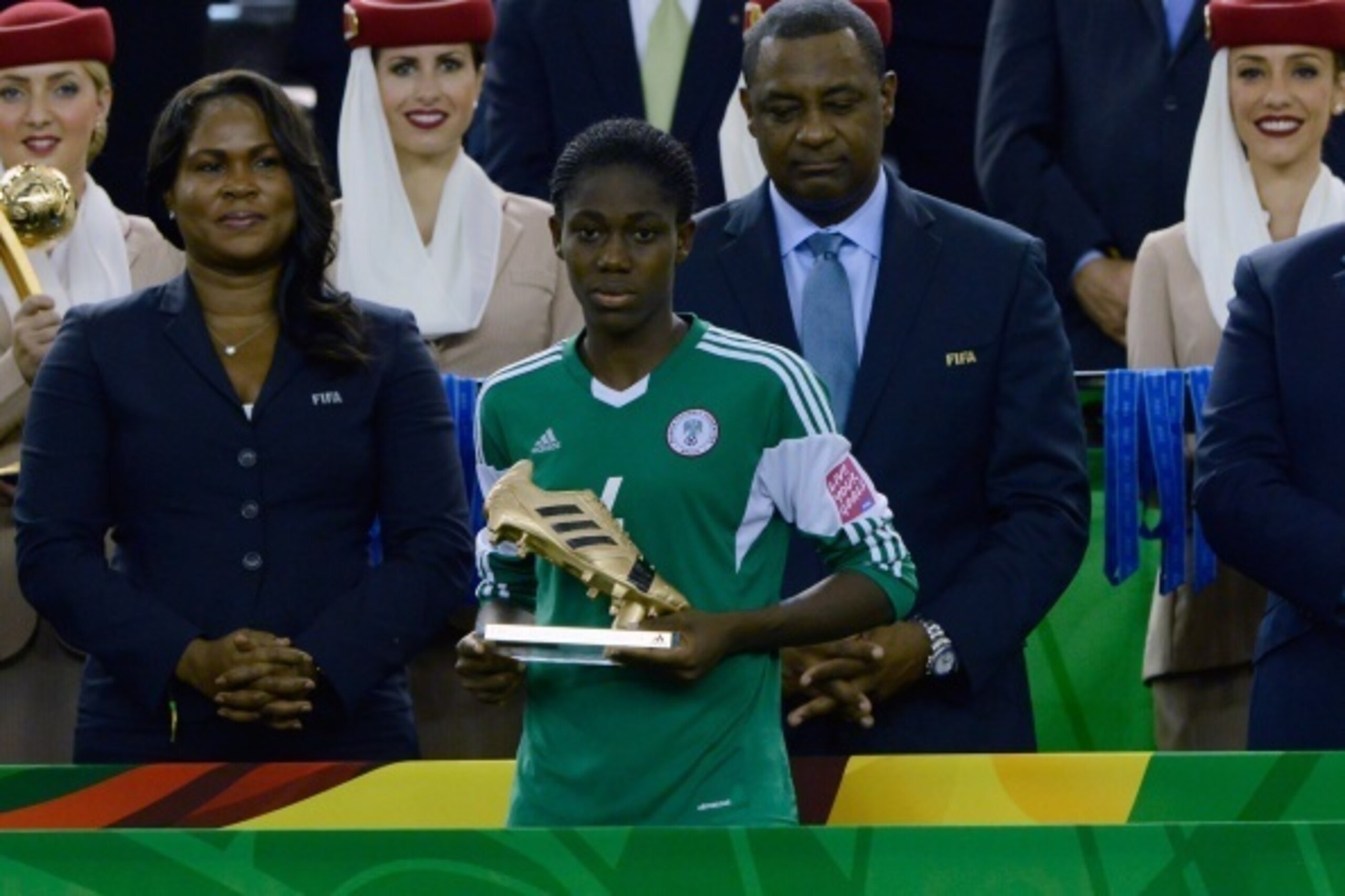 MONTREAL, QC - AUGUST 24:  Asisat Oshoala of Nigeria with the Golden Boot Trophy during the FIFA Women's U-20 Final against the Germany at Olympic Stadium on August 24, 2014 in Montreal, Quebec, Canada.  Germany defeated Nigeria 1-0 in overtime.  Photo by