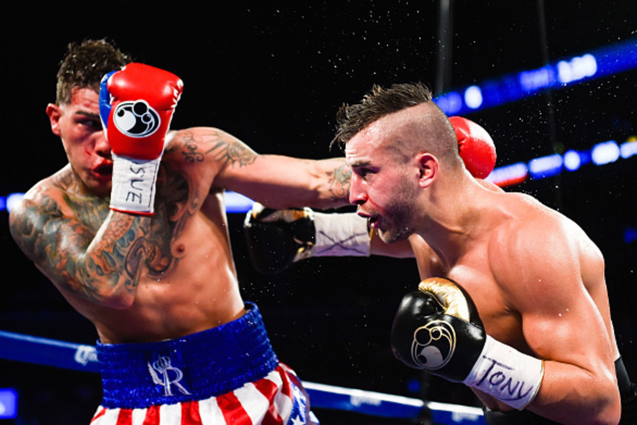 NEW YORK, NY - DECEMBER 06: Gabriel Rosado (L) throws a punch at David Lemieux during a NABF Middleweight title fight at the Barclays Center on December 6, 2014 in the Brooklyn Borough of New York City. (Photo by Alex Goodlett/Getty Images) NEW YORK, NY - DECEMBER 06: Gabriel Rosado (L) throws a punch at David Lemieux during a NABF Middleweight title fight at the Barclays Center on December 6, 2014 in the Brooklyn Borough of New York City. (Photo by Alex Goodlett/Getty Images)