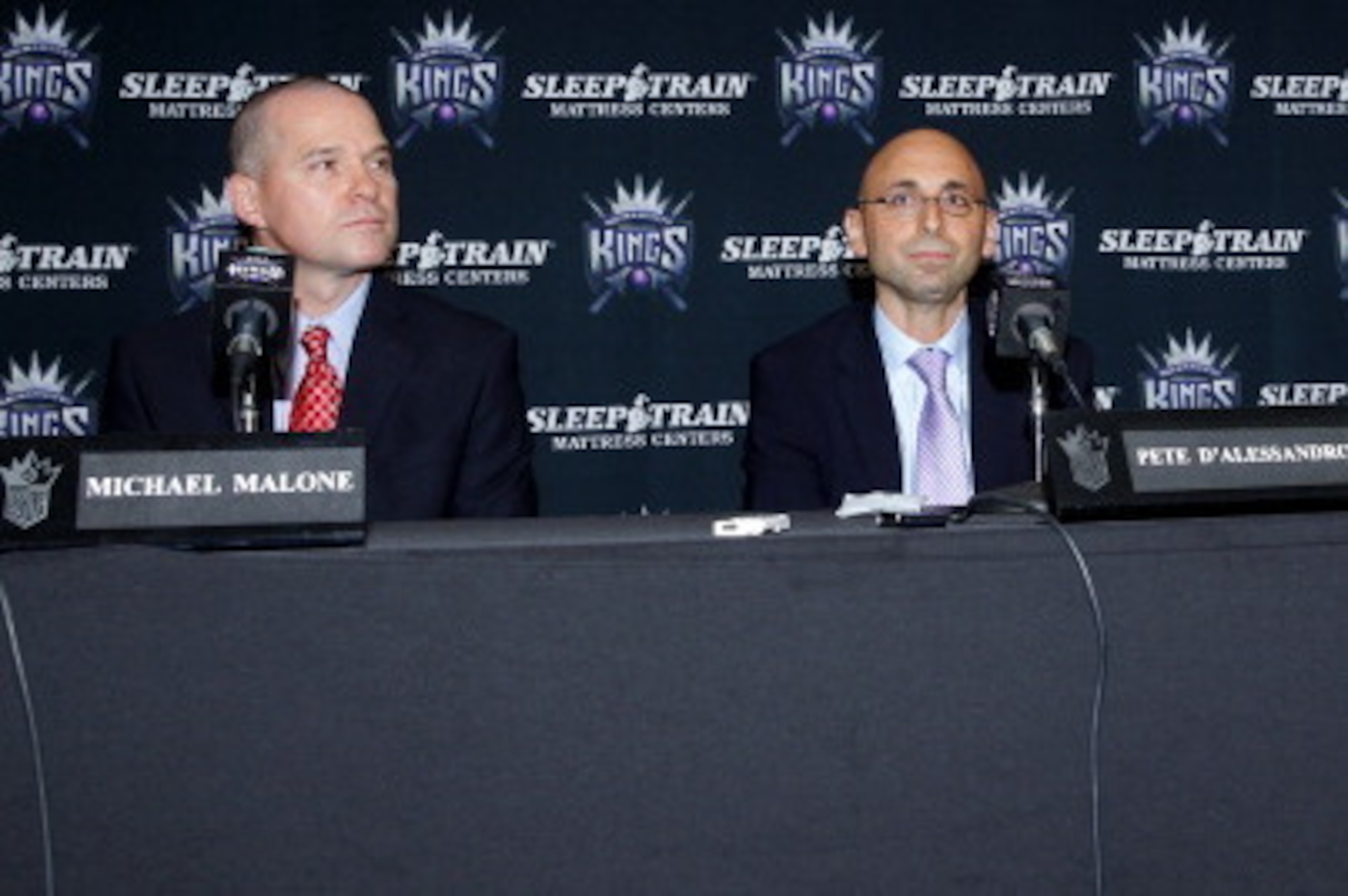SACRAMENTO, CA - JUNE 17:  Michael Malone, Pete D'Alessandro and Vivek Ranadive address the media as Pete D'Alessandro is announced as the new General Manager of the Sacramento Kings on June 17, 2013 at Sleep Train Arena in Sacramento, California. NOTE TO