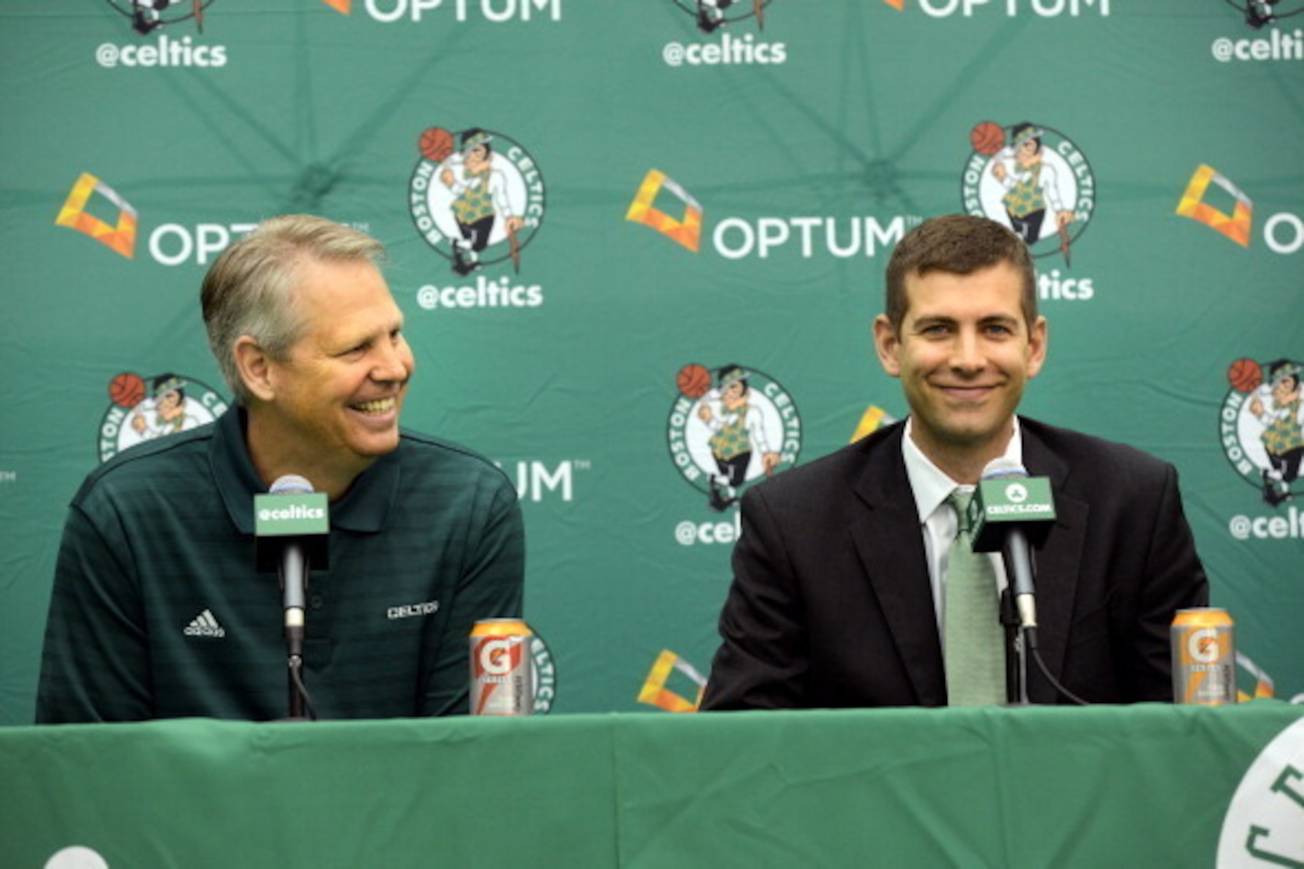WALTHAM, MA - JULY 5: New Boston Celtics head coach Brad Stevens (R) is introduced to the media by President of Basketball Operations Danny Ainge July 5, 2013 in Waltham, Massachusetts. Stevens was hired away from Butler University where he led the Bulldo