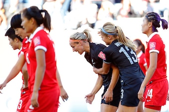 WINNIPEG, MB - JUNE 15:  Hannah Wilkinson #17 of New Zealand celebrates scoring their second goal against China PR with Rosie White #13 during the FIFA Women's World Cup Canada 2015 Group A match between China PR and New Zealand at Winnipeg Stadium on Jun
