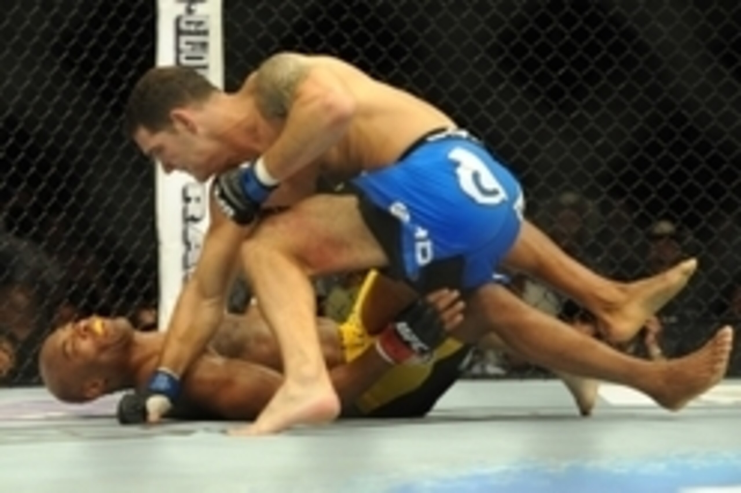 Jul 6, 2013; Las Vegas, NV, USA; Chris Weidman, blue shorts, defeated Anderson Silva (yellow shorts) in their Middleweight Chamionship Bout in the second round with a TKO at the MGM Grand Garden Arena. Mandatory Credit: Jayne Kamin-Oncea-USA TODAY Sports Jul 6, 2013; Las Vegas, NV, USA; Chris Weidman, blue shorts, defeated Anderson Silva (yellow shorts) in their Middleweight Chamionship Bout in the second round with a TKO at the MGM Grand Garden Arena. Mandatory Credit: Jayne Kamin-Oncea-USA TODAY Sports