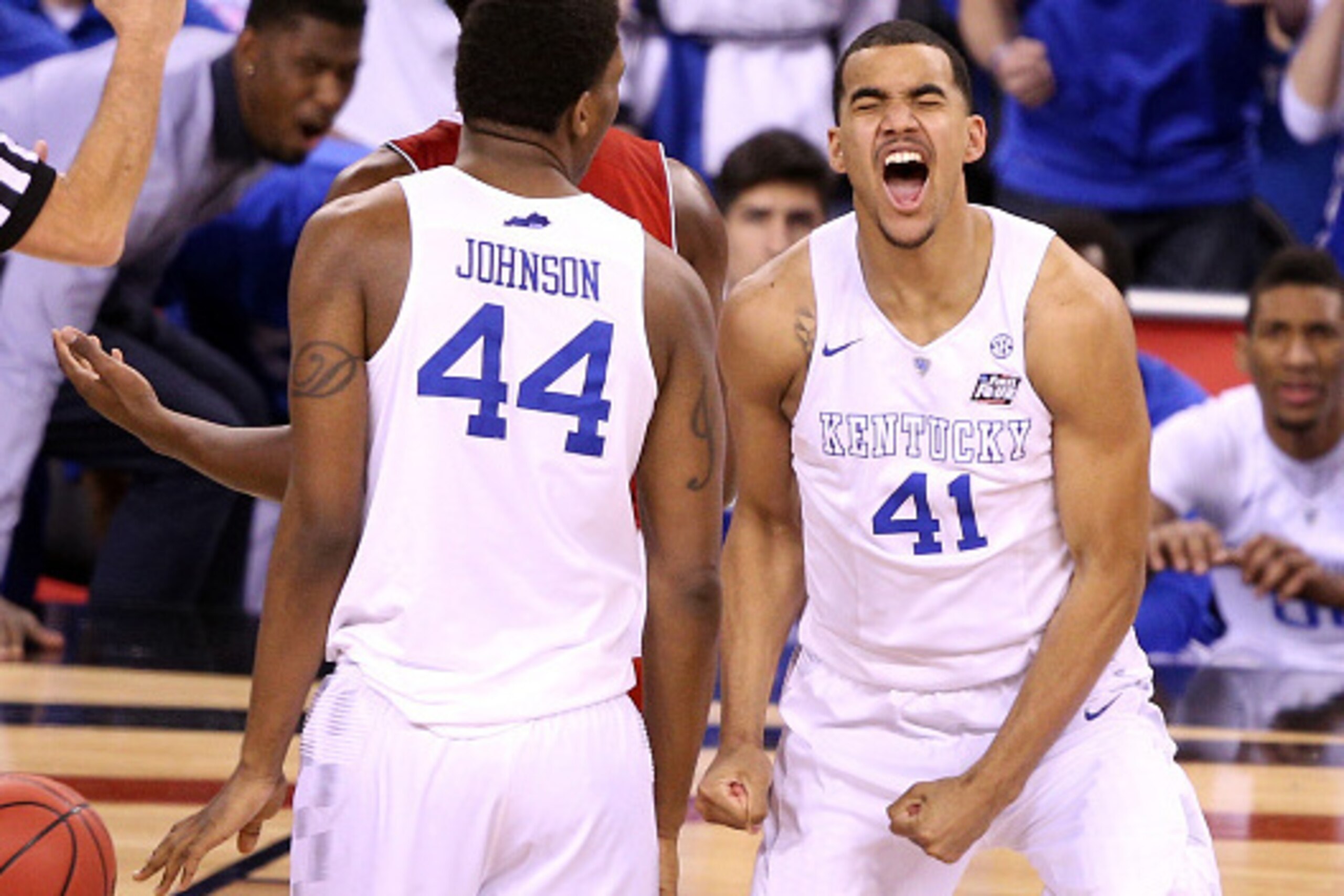 INDIANAPOLIS, IN - APRIL 04: Dakari Johnson #44 and Trey Lyles #41 of the Kentucky Wildcats react after a play in the second half against the Wisconsin Badgers during the NCAA Men's Final Four Semifinal at Lucas Oil Stadium on April 4, 2015 in Indianapoli