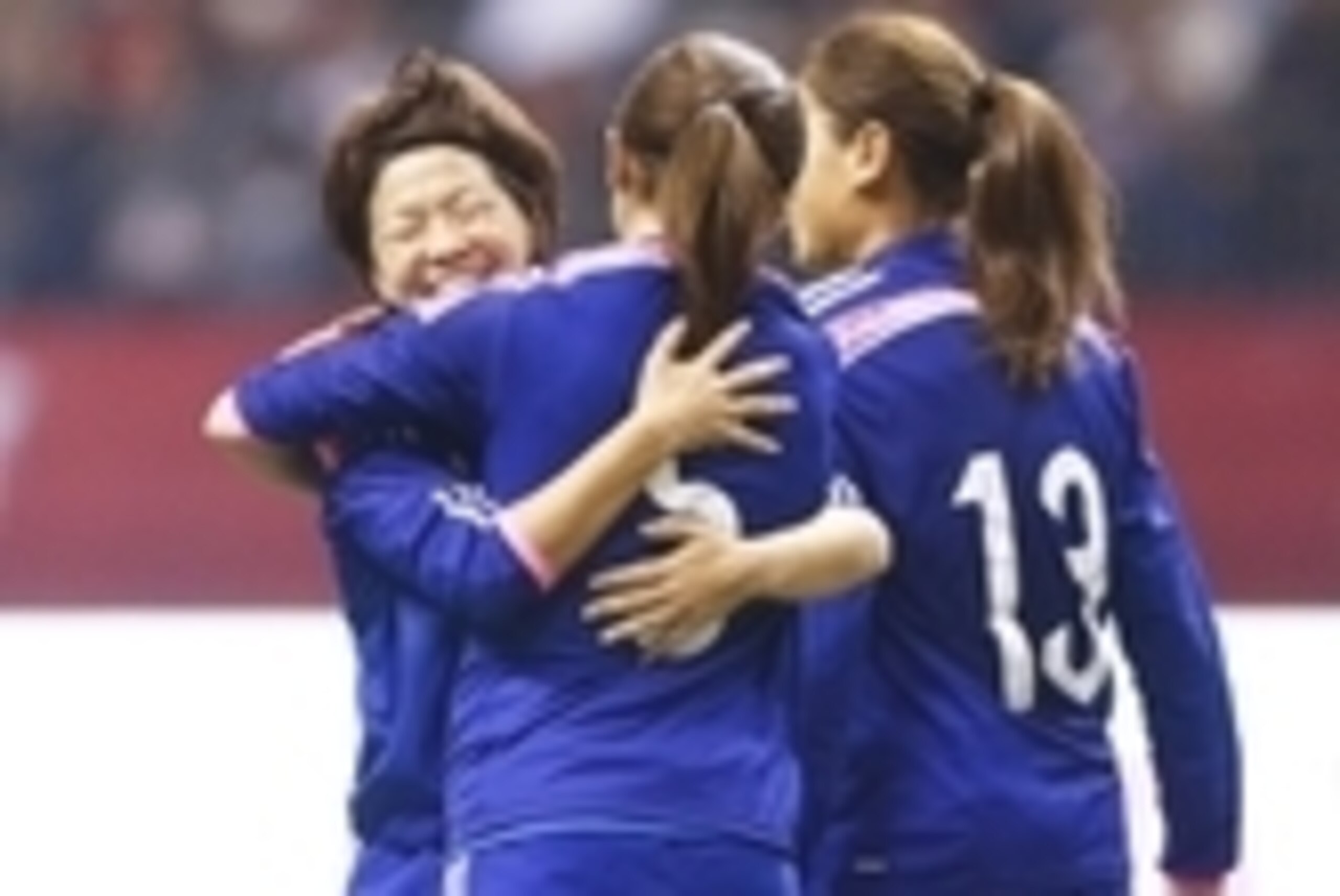 Oct 28, 2014; Vancouver, British Columbia, Canada; Japan defender Aya Sameshima (5) celebrates with Japan midfielder Aya Miyama (8) after scoring a game-winning goal in the 93rd minute against Canada at BC Place. Japan defeated Canada, 3-2. Mandatory Cred