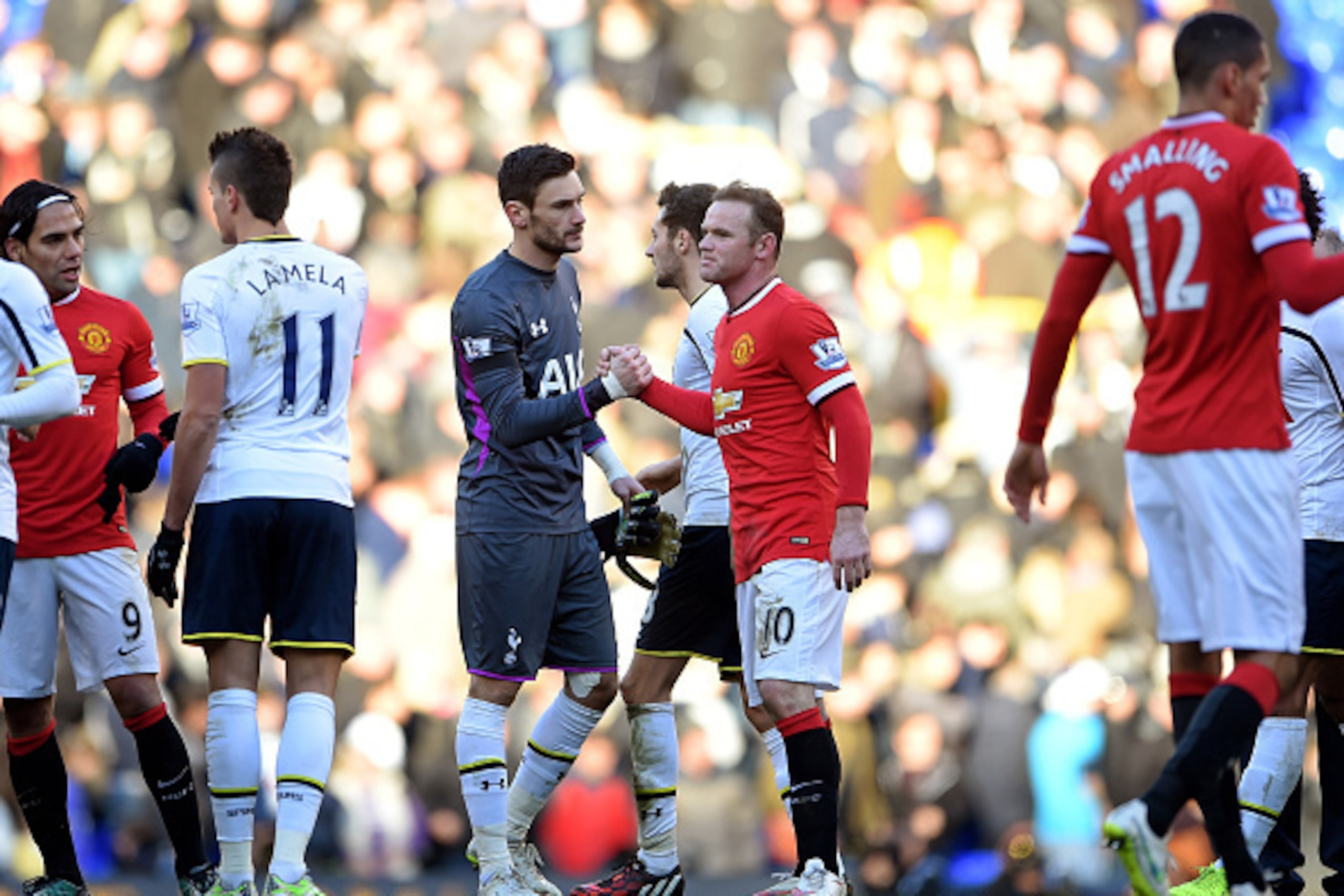 LONDON, ENGLAND - DECEMBER 28:  Opposing captains Hugo Lloris of Spurs and Wayne Rooney of Manchester United shake hands following the 0-0 draw during the Barclays Premier League match between Tottenham Hotspur and Manchester United at White Hart Lane on 