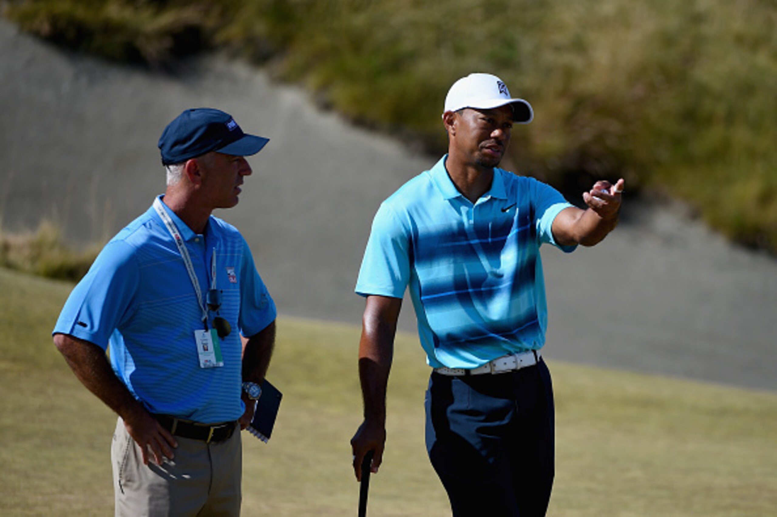 UNIVERSITY PLACE, WA - JUNE 15:  Tiger Woods (R) of the United States talks with Corey Pavin (L) during a practice round prior to the start of the 115th U.S. Open Championship at Chambers Bay on June 15, 2015 in University Place, Washington.  (Photo by Ro