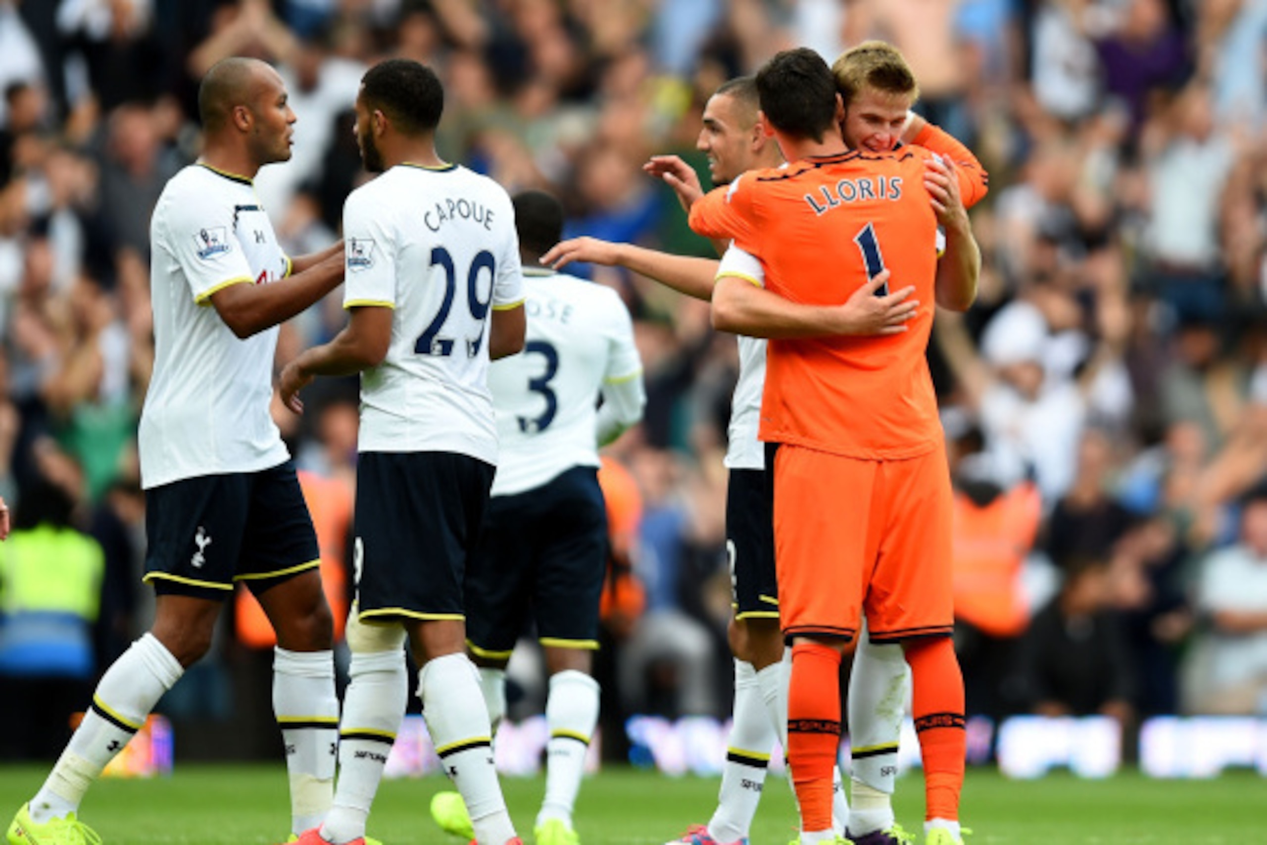 LONDON, ENGLAND - AUGUST 16:  Matchwinning goalscorer Eric Dier (R) of Spurs is congratulated by teammate Hugo Lloris following their team's 1-0 victory during the Barclays Premier League match between West Ham United and Tottenham Hotspur at Boleyn Groun