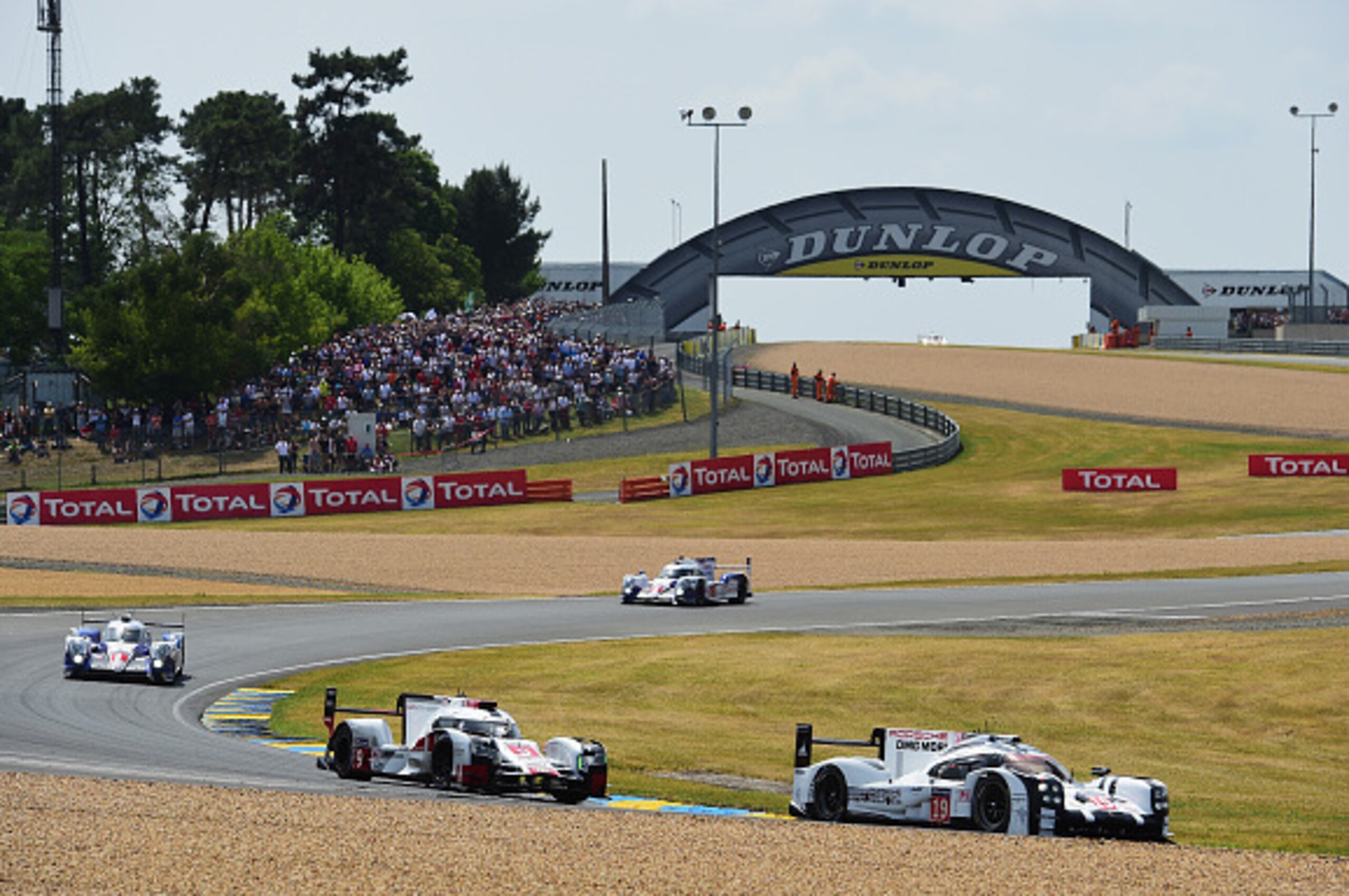 LE MANS, FRANCE - JUNE 13:  Porche Team driven by Nico Hulkenberg, Earl Bamber and Nick Tandy during the Le Mans 24 Hour race at the Circuit de la Sarthe on June 13, 2015 in Le Mans, France.  (Photo by Shaun Botterill/Getty Images)