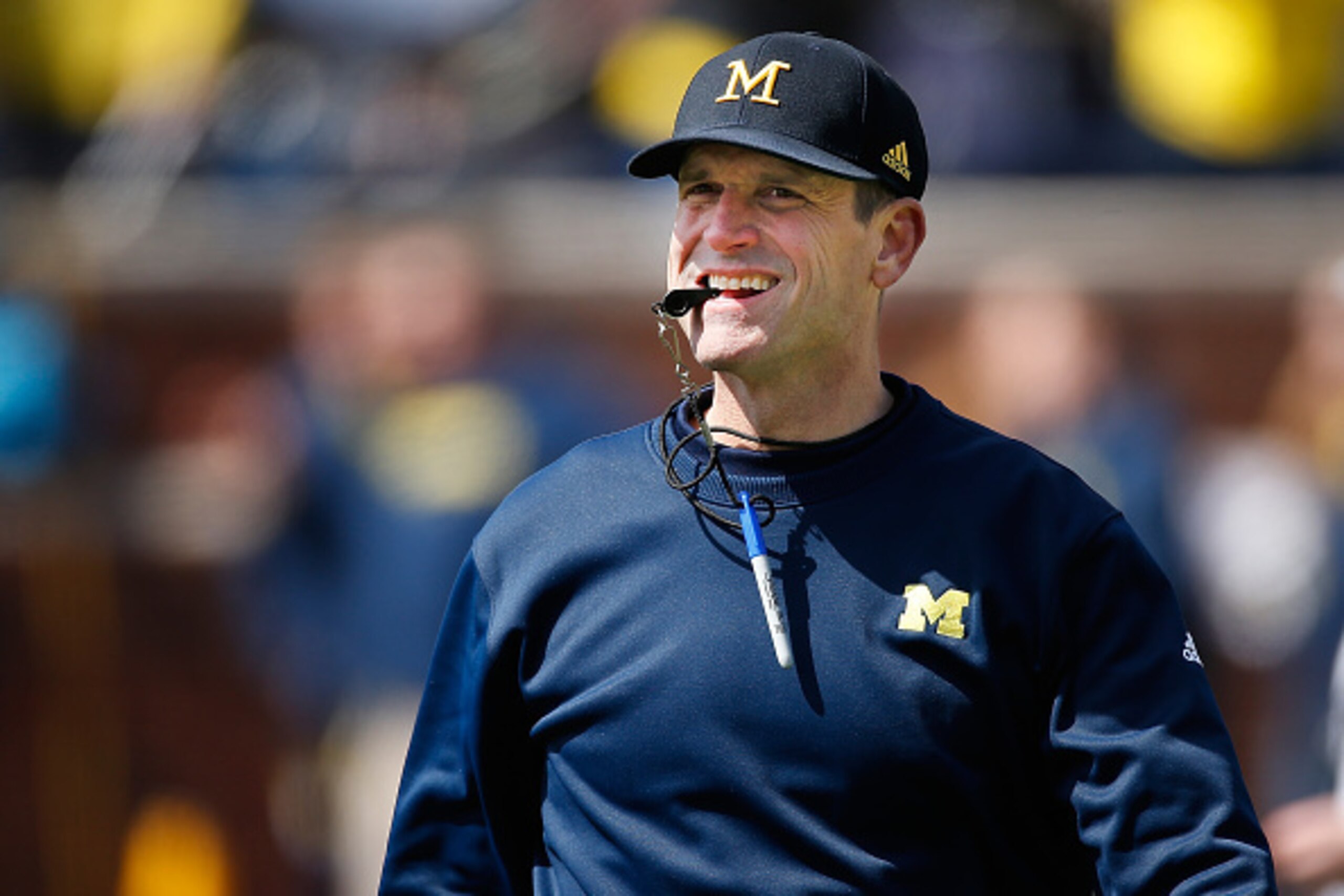 ANN ARBOR, MI - APRIL 04: Head coach Jim Harbaugh of the Michigan Wolverines looks on during the Michigan Football Spring Game on April 4, 2015 at Michigan Stadium in Ann Arbor, Michigan.  (Photo by Gregory Shamus/Getty Images)