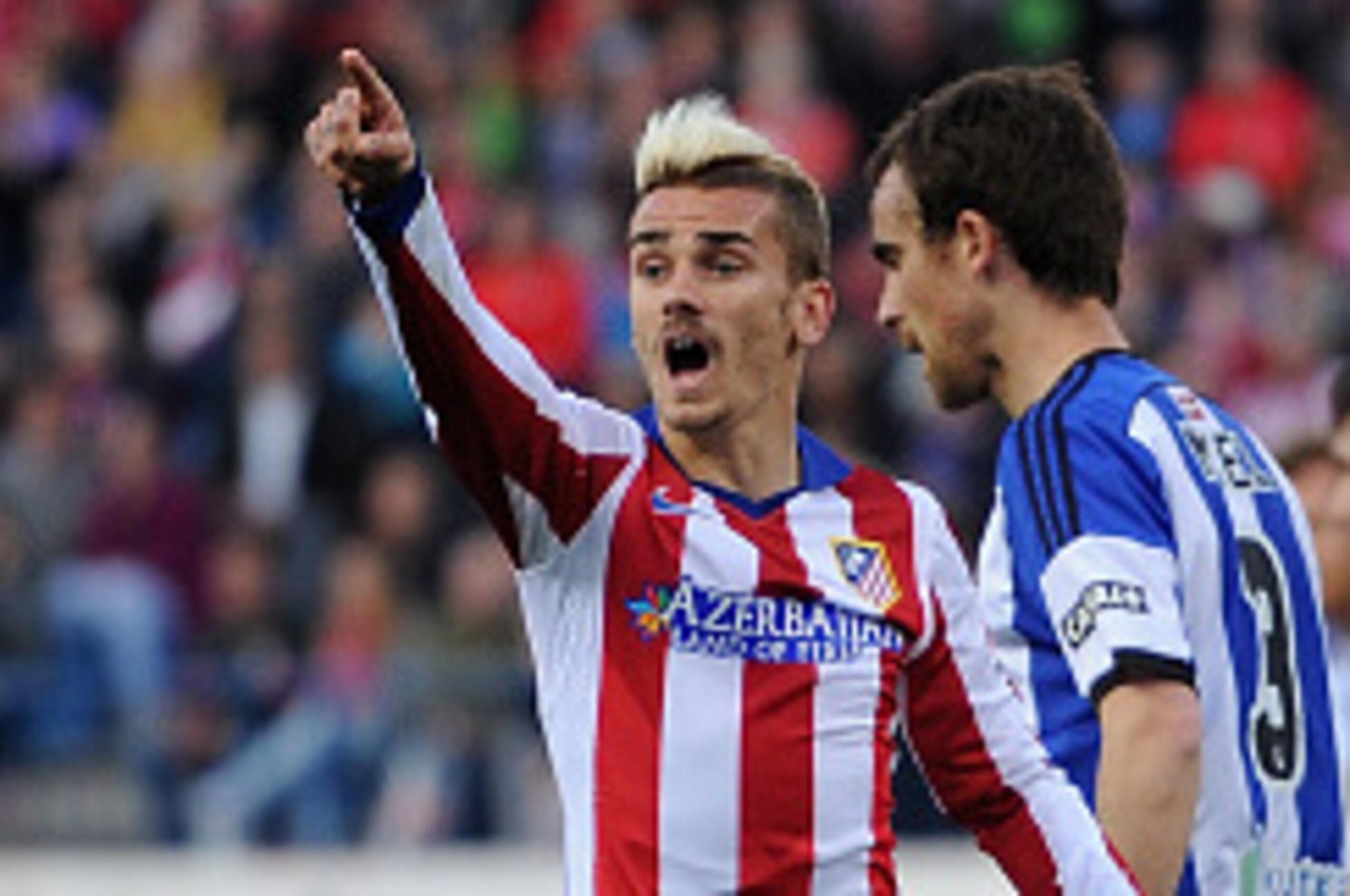 MADRID, SPAIN - APRIL 07:  Antoine Griezmann of Club Atletico de Madrid reacts to a call from the linesman during the La Liga match between Club Atletico de Madrid and Real Sociedad at Vicente Calderon Stadium on April 7, 2015 in Madrid, Spain.  (Photo by