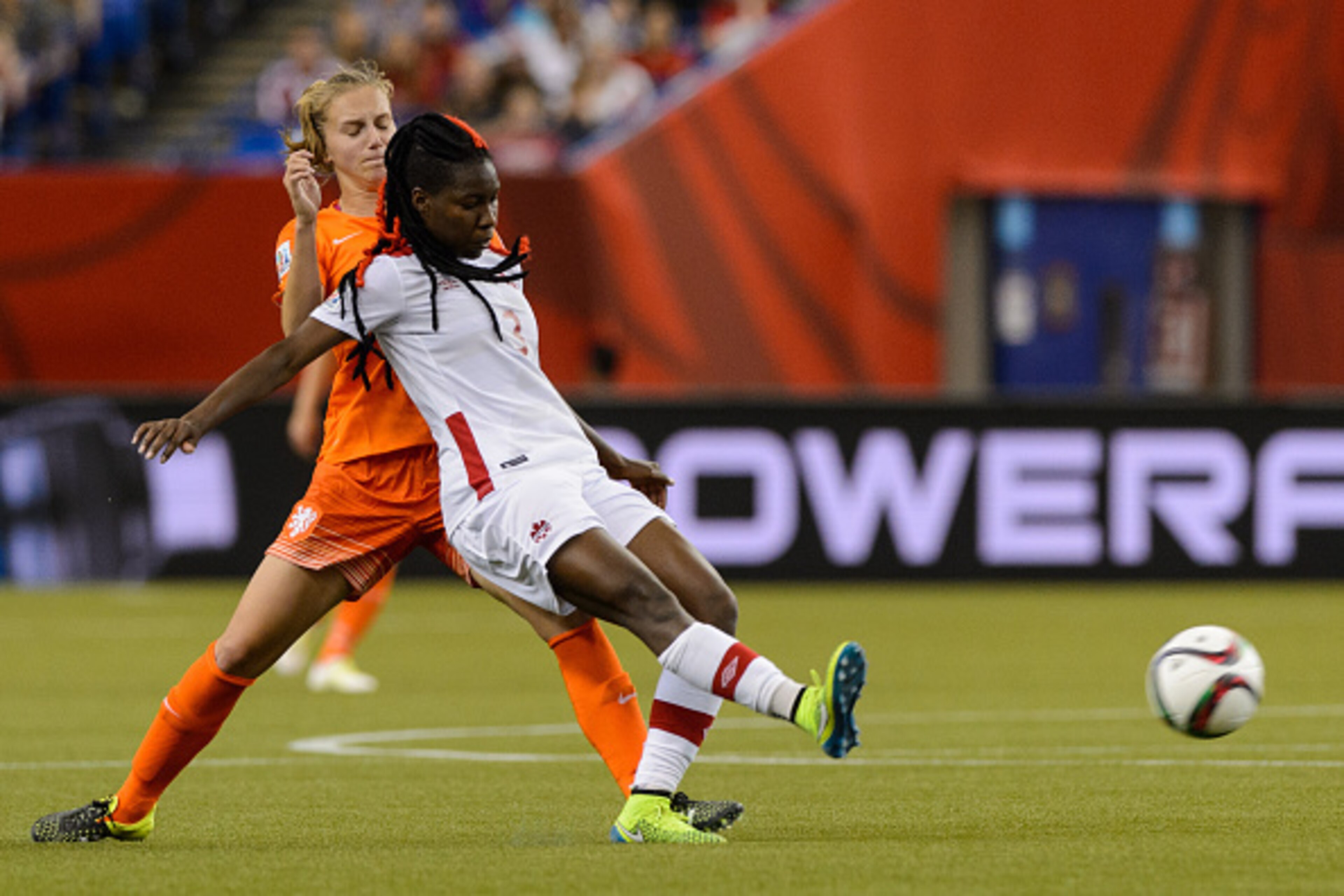 MONTREAL, QC - JUNE 15:  Vivianne Miedema #9 of the Netherlands challenges Kadeisha Buchanan #3 of Canada during the 2015 FIFA Women's World Cup Group A match at Olympic Stadium on June 15, 2015 in Montreal, Quebec, Canada. (Photo by Minas Panagiotakis/Ge
