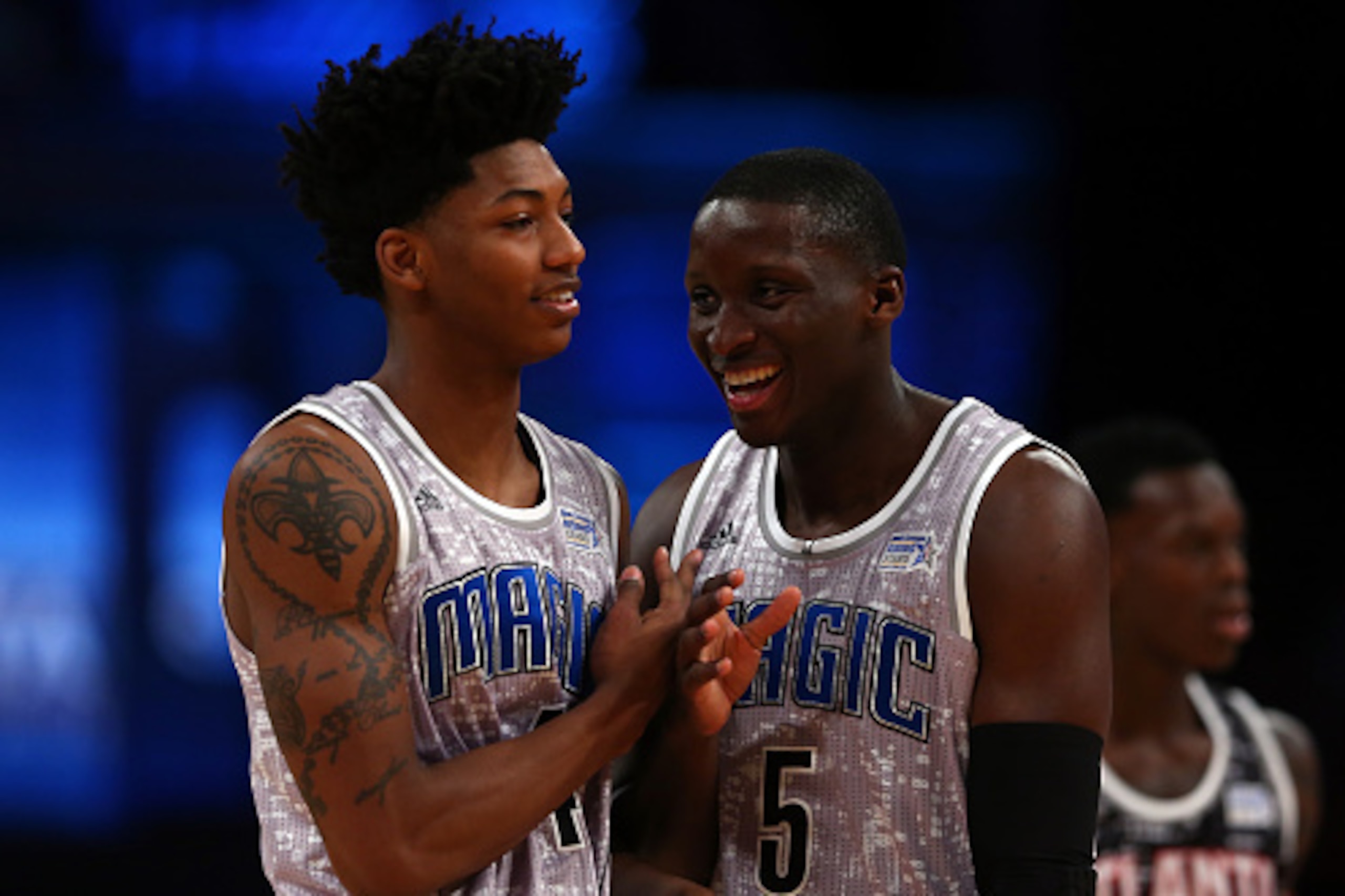 NEW YORK, NY - FEBRUARY 13: U.S. Team's Elfrid Payton #4 of the Orlando Magic reacts with U.S. Team's Victor Oladipo #5 of the Orlando Magic during the BBVA Compass Rising Stars Challenge as part of the 2015 NBA Allstar Weekend at the Barclays Center on NEW YORK, NY - FEBRUARY 13: U.S. Team's Elfrid Payton #4 of the Orlando Magic reacts with U.S. Team's Victor Oladipo #5 of the Orlando Magic during the BBVA Compass Rising Stars Challenge as part of the 2015 NBA Allstar Weekend at the Barclays Center on