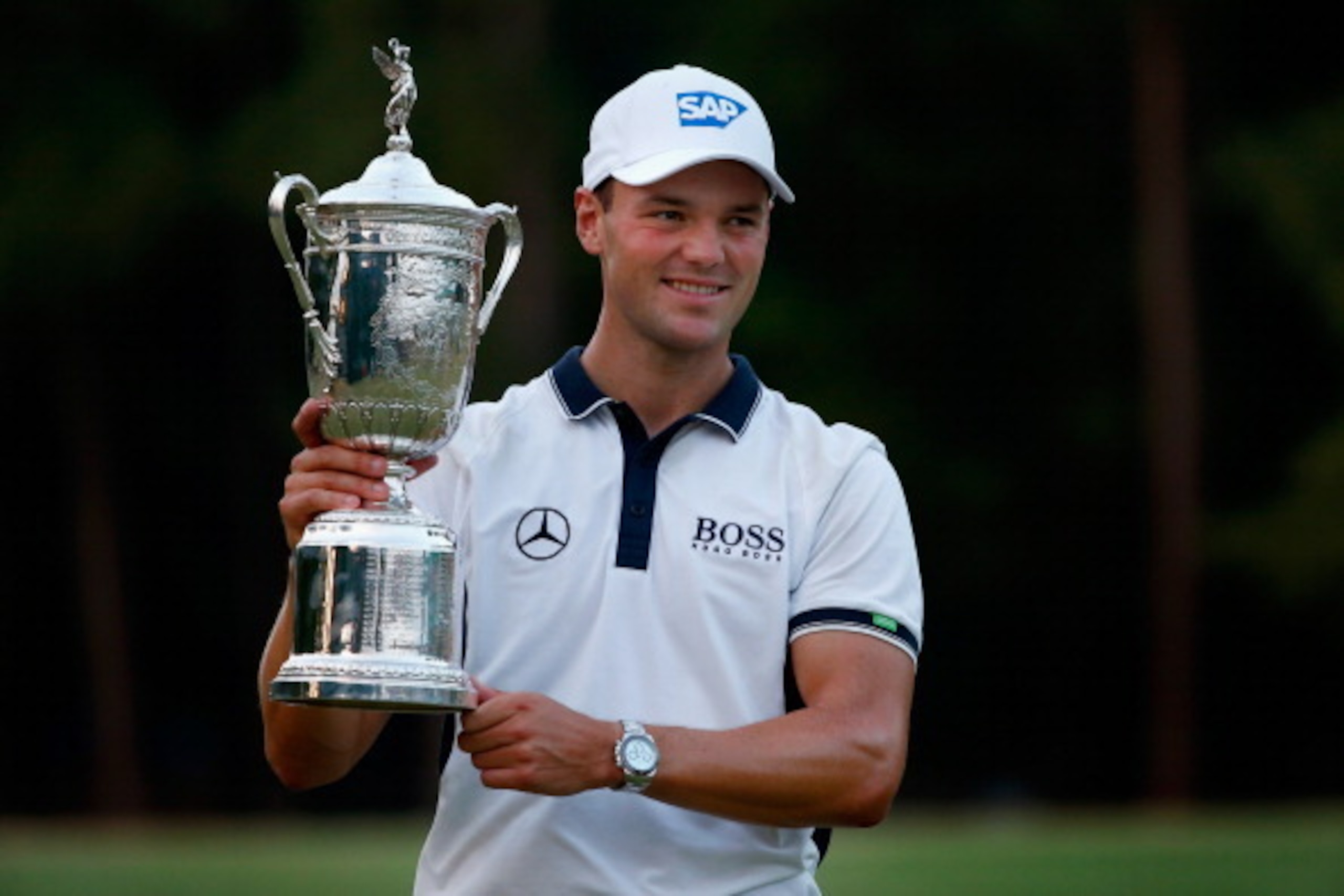 PINEHURST, NC - JUNE 15:  Martin Kaymer of Germany celebrates with the trophy after his eight-stroke victory during the final round of the 114th U.S. Open at Pinehurst Resort & Country Club, Course No. 2 on June 15, 2014 in Pinehurst, North Carolina.  (Ph