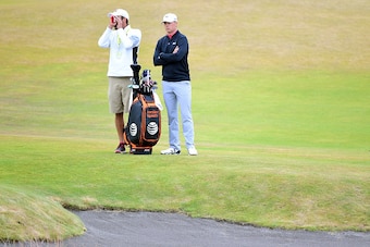 UNIVERSITY PLACE, WA - JUNE 16: Jordan Spieth of the United States waits alongside caddie Michael Greller during a practice round prior to the start of the 115th U.S. Open Championship at Chambers Bay on June 16, 2015 in University Place, Washington.  (Ph