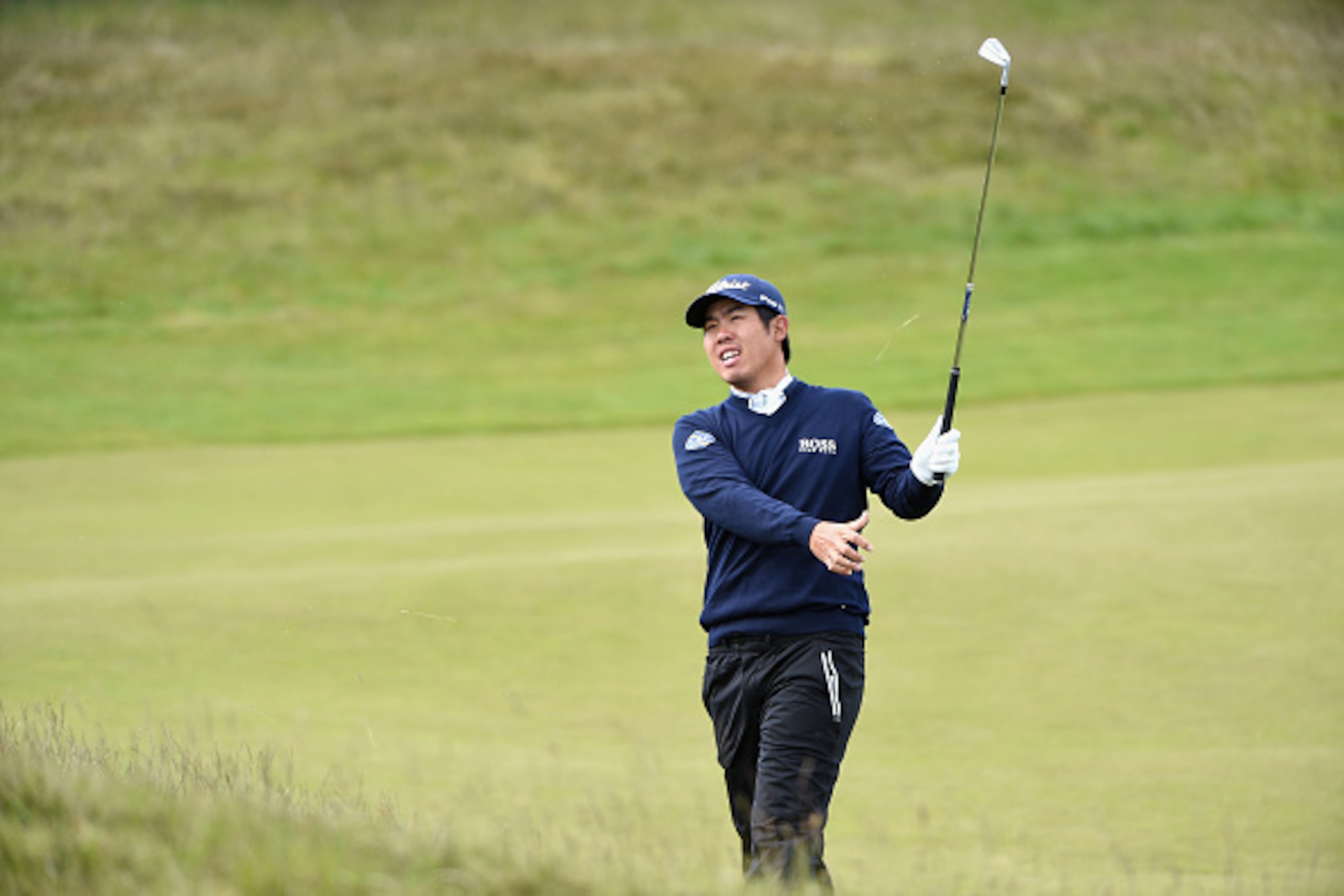 NEWCASTLE, NORTHERN IRELAND - MAY 29:  Byeong-Hun An of South Korea hits his 2nd shot on the 13th hole during the Second Round of the Dubai Duty Free Irish Open Hosted by the Rory Foundation at Royal County Down Golf Club on May 29, 2015 in Newcastle, Nor