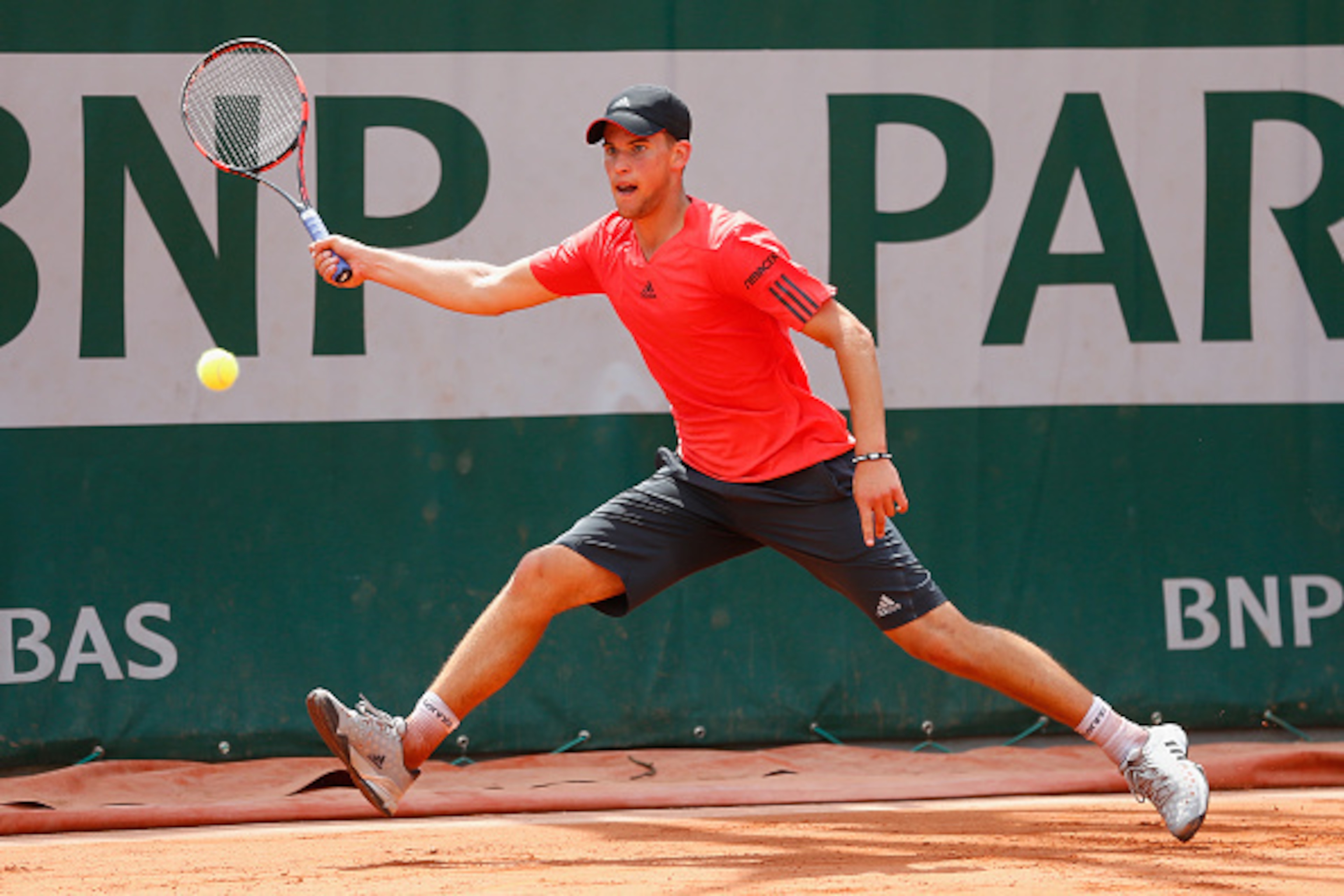 PARIS, FRANCE - MAY 25:  Dominic Thiem of Austria plays a forehand in his Men's Singles match against Aljaz Bedene of Great Britain Dominic Thiem of Austria on day two of the 2015 French Open at Roland Garros on May 25, 2015 in Paris, France.  (Photo by J