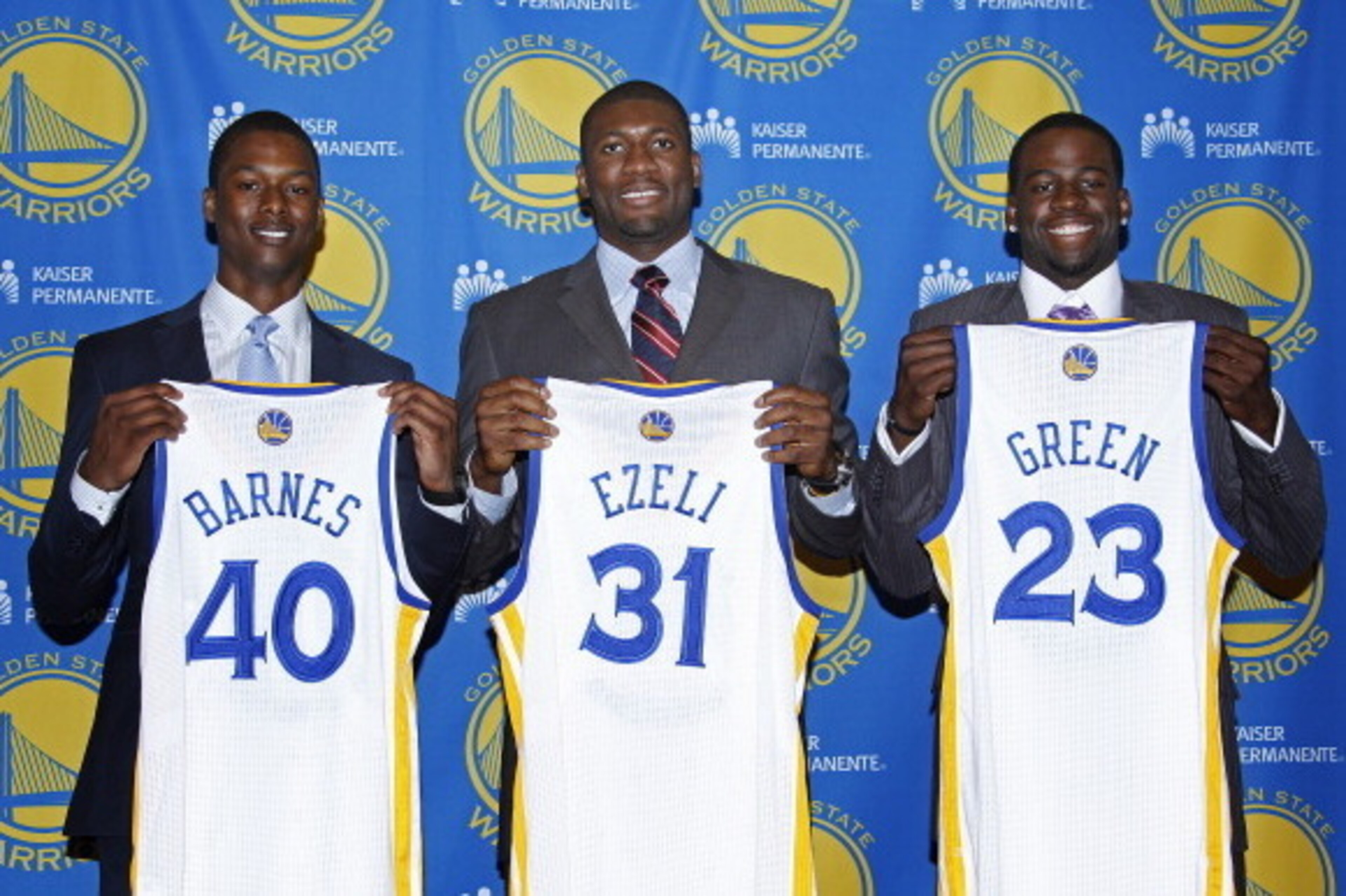 OAKLAND, CA - JULY 2: Harrison Barnes #40, Festus Ezeli #31 and Draymond Green #23 of the Golden State Warriors poses for a photo at the Warriors draft pick press conference on July 2, 2012 in Oakland, California. NOTE TO USER: User expressly acknowledges OAKLAND, CA - JULY 2: Harrison Barnes #40, Festus Ezeli #31 and Draymond Green #23 of the Golden State Warriors poses for a photo at the Warriors draft pick press conference on July 2, 2012 in Oakland, California. NOTE TO USER: User expressly acknowledges