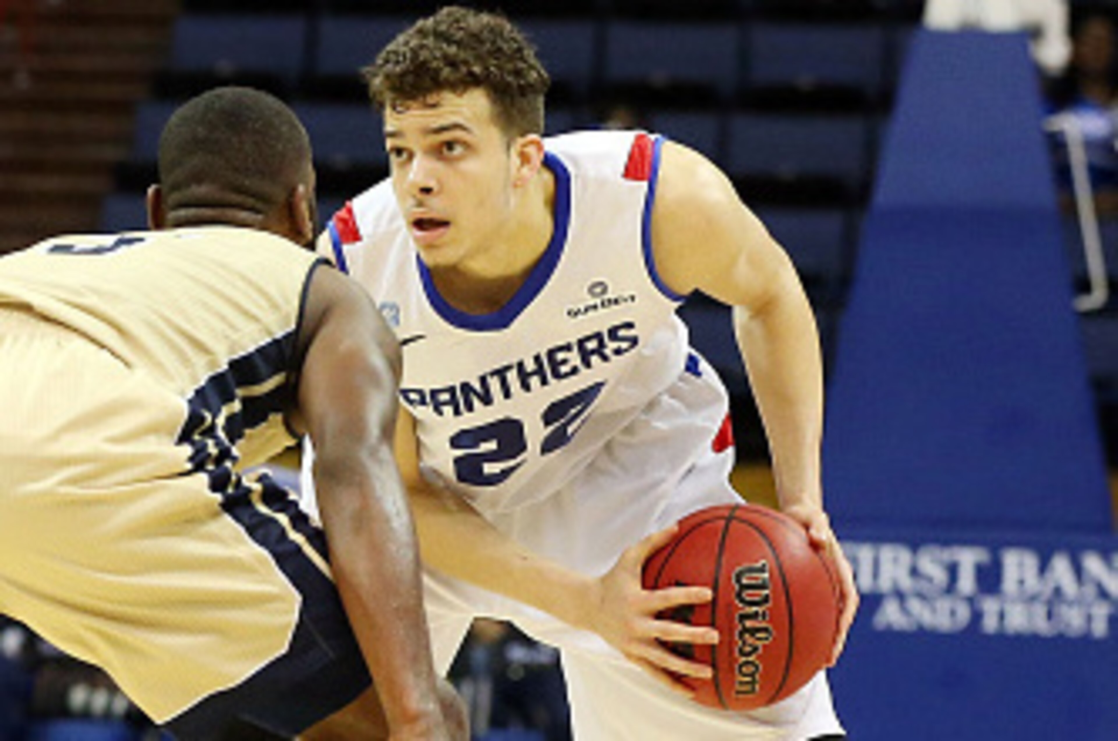 NEW ORLEANS, LA - MARCH 15:   R.J. Hunter #22 of the Georgia State Panthers is defended by Jelani Hewitt #5 of the Georgia Southern Eagles during the Sun Belt Conference Men's Championship game at the UNO Lakefront Arena on March 15, 2015 in New Orleans, 
