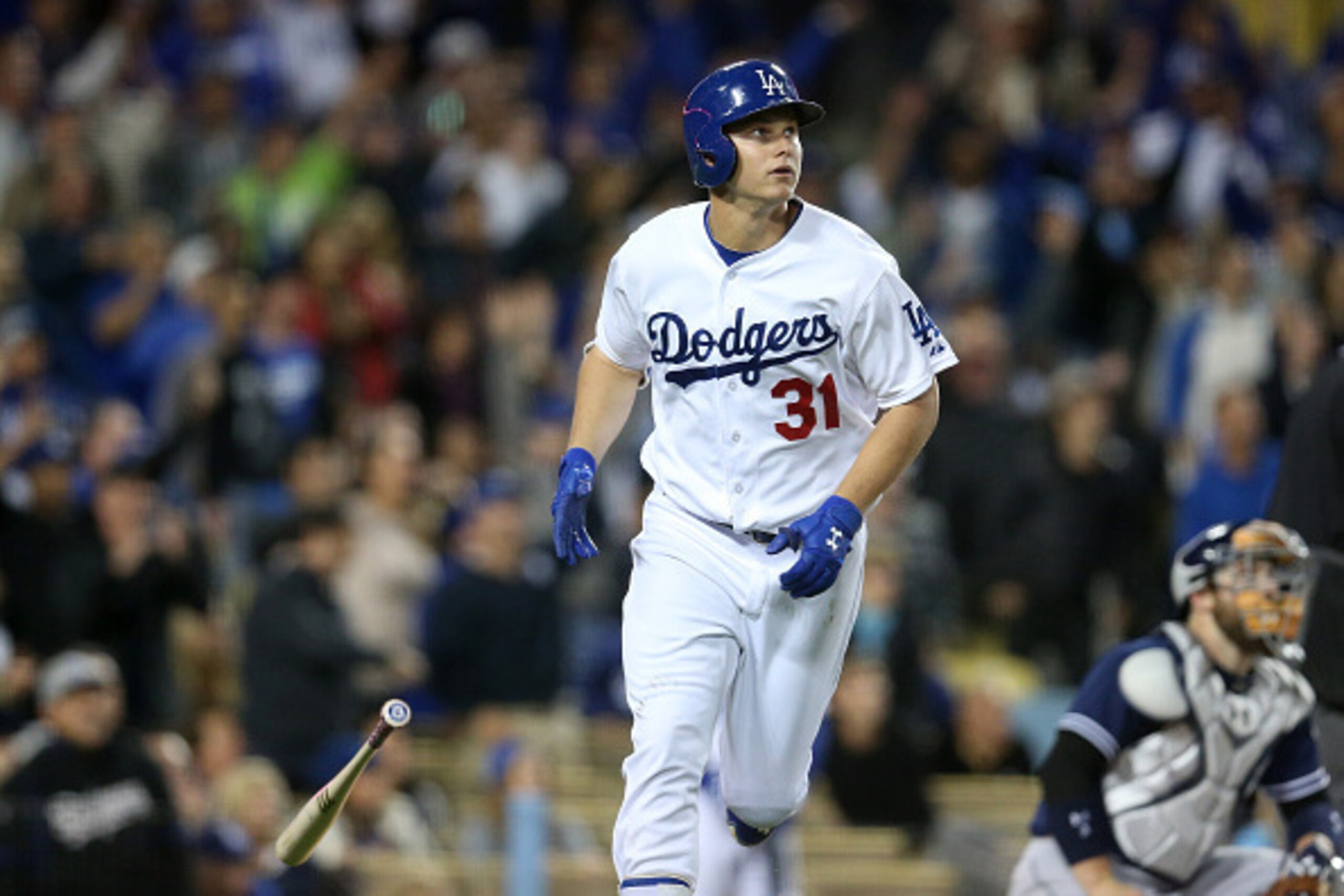 LOS ANGELES, CA - MAY 22:  Joc Pederson #31 of the Los Angeles Dodgers drops hs bat as he watches his solo home run in the eighth inning to give the Dodgers a 2-1 lead against the San Diego Padres at Dodger Stadium on May 22, 2015 in Los Angeles, Californ