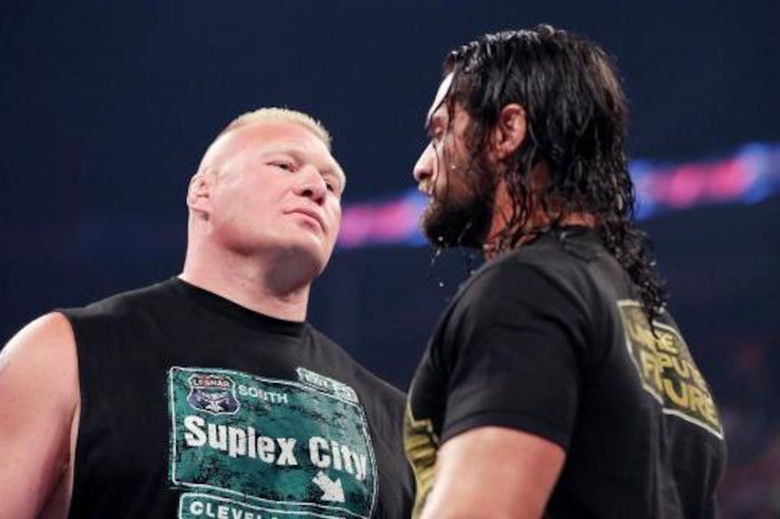 Rollins and Lesnar face off.