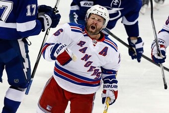 TAMPA, FL - MAY 22:  Martin St. Louis #26 celebrates after scoring a goal agianst Ben Bishop #30 of the Tampa Bay Lightning during the third period in Game Four of the Eastern Conference Finals during the 2015 NHL Stanley Cup Playoffs at Amalie Arena on M