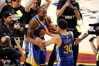 CLEVELAND, OH - JUNE 16: Andre Iguodala #9 and Stephen Curry #30 of the Golden State Warriors celebrate winning the 2015 NBA Finals against the Cleveland Cavaliers in Game Six of the 2015 NBA Finals at The Quicken Loans Arena on June 16, 2015 in Cleveland