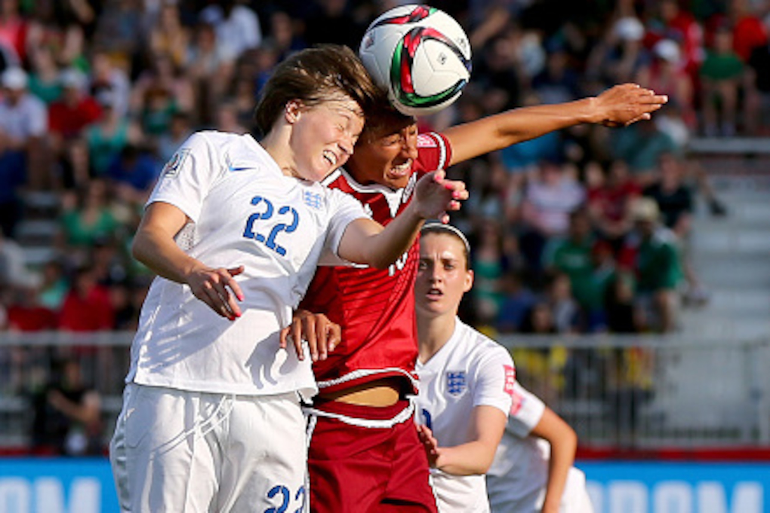 MONCTON, NB - JUNE 13:  Fran Kirby #22 of England and Stephany Mayor #10 of Mexico go for the header in the second half during the FIFA Women's World Cup 2015 Group F match at Moncton Stadium on June 13, 2015 in Moncton, Canada.  (Photo by Elsa/Getty Imag