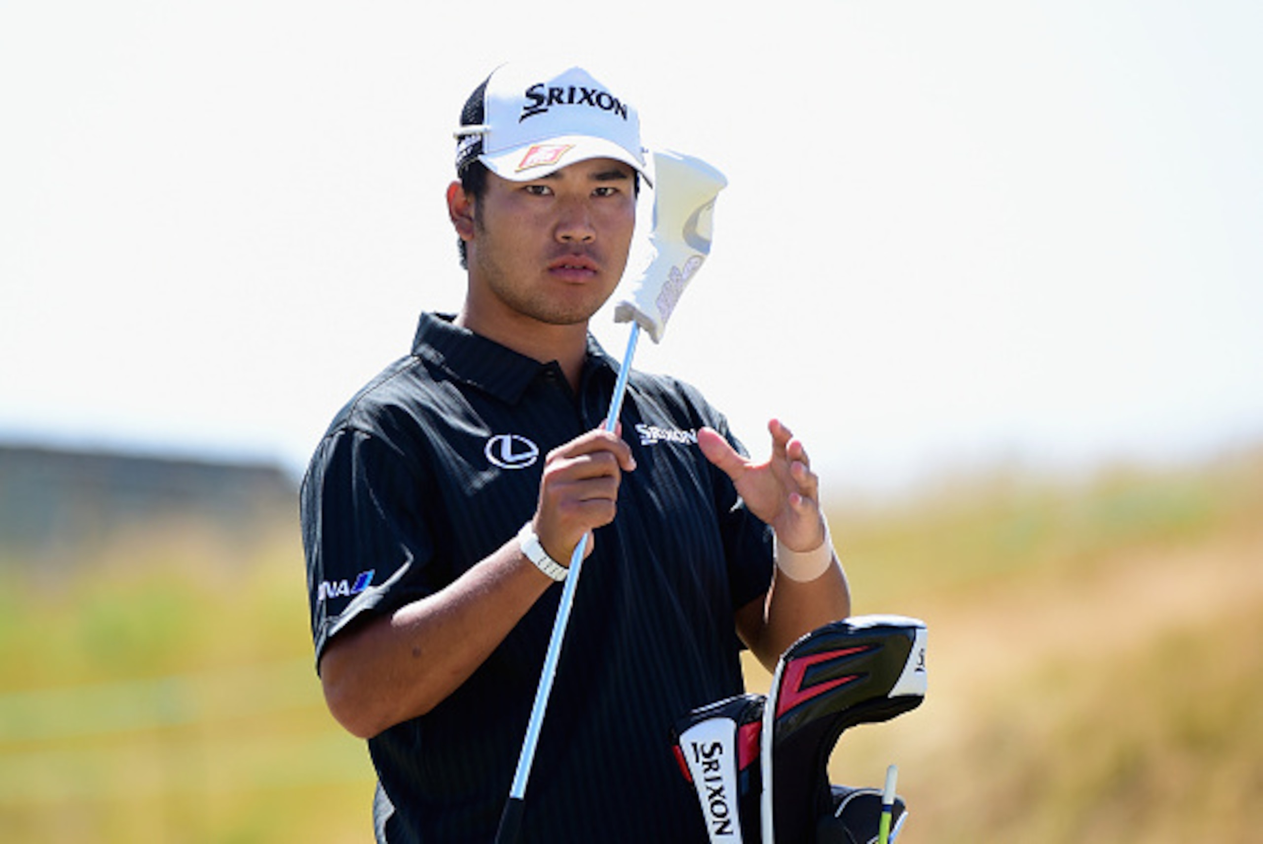 UNIVERSITY PLACE, WA - JUNE 16:  Hideki Matsuyama of Japan pulls a club from his bag during a practice round prior to the start of the 115th U.S. Open Championship at Chambers Bay on June 16, 2015 in University Place, Washington.  (Photo by Harry How/Gett