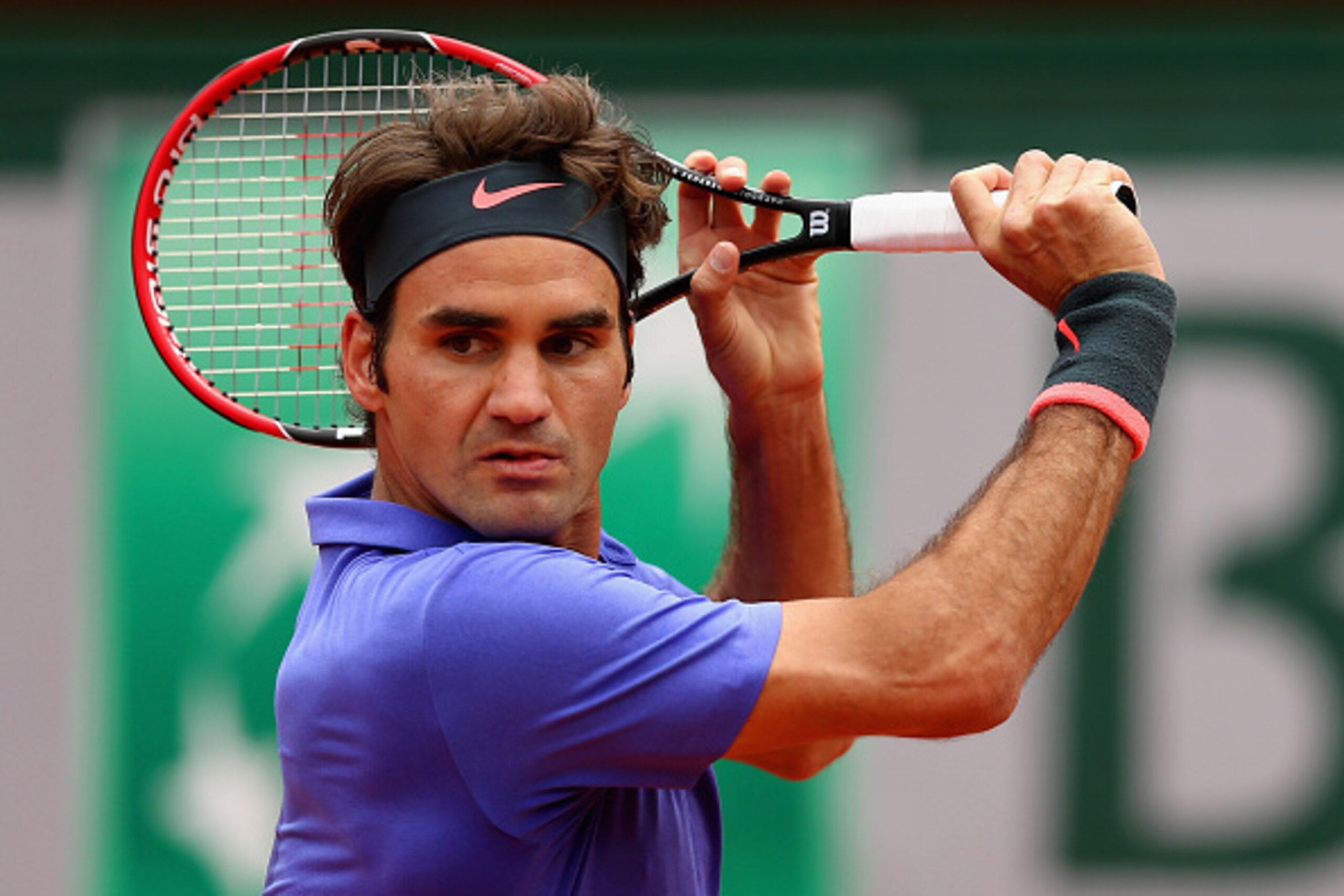 PARIS, FRANCE - MAY 29:  Roger Federer of Switzerland in action in his Men's Singles match against Damir Dzumhur of Bosnia and Herzegovina on day six of the 2015 French Open at Roland Garros on May 29, 2015 in Paris, France.  (Photo by Clive Brunskill/Get