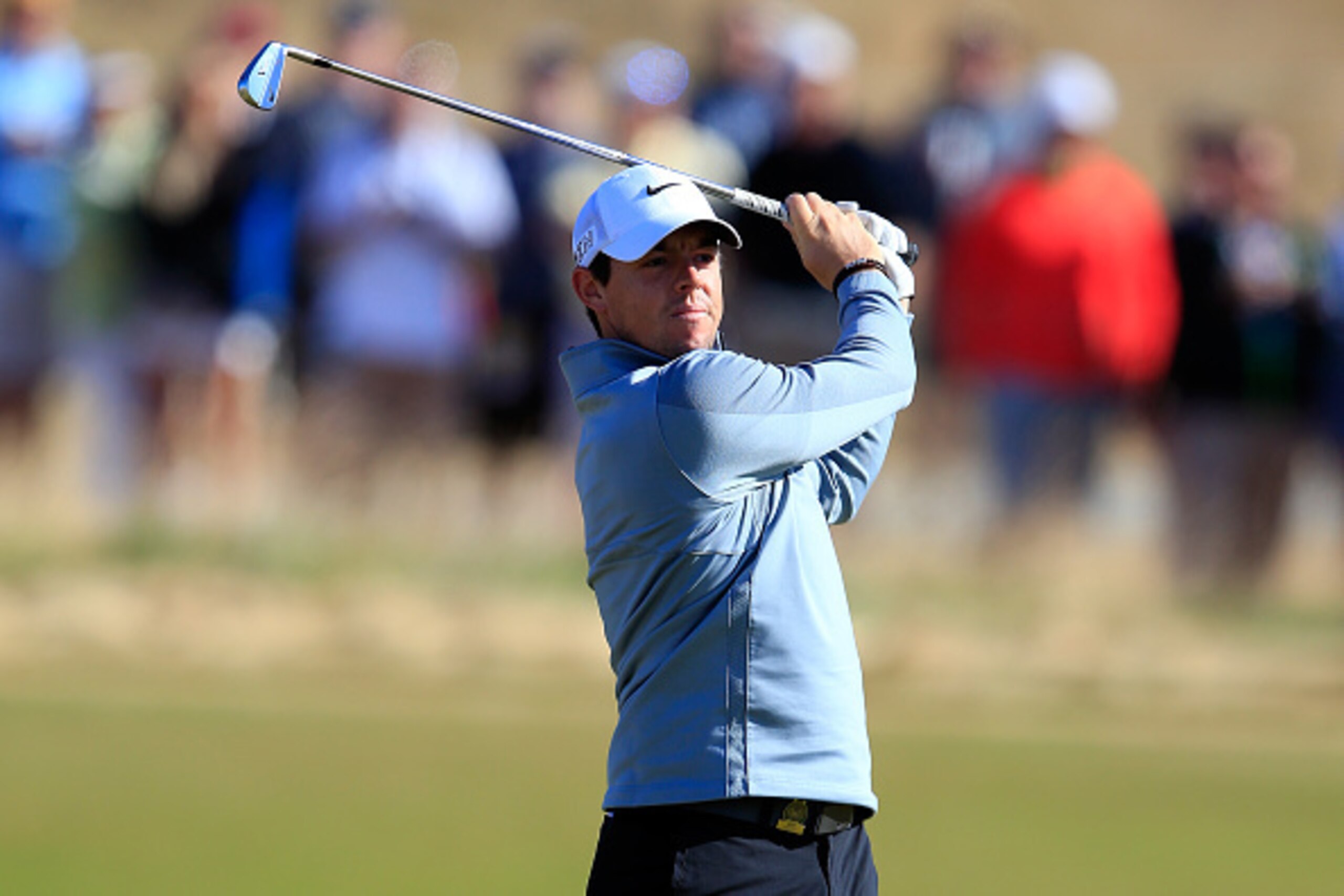 UNIVERSITY PLACE, WA - JUNE 17:  Rory McIlroy of Northern Ireland hits an approach shot during a practice round prior to the start of the 115th U.S. Open Championship at Chambers Bay on June 17, 2015 in University Place, Washington.  (Photo by David Canno