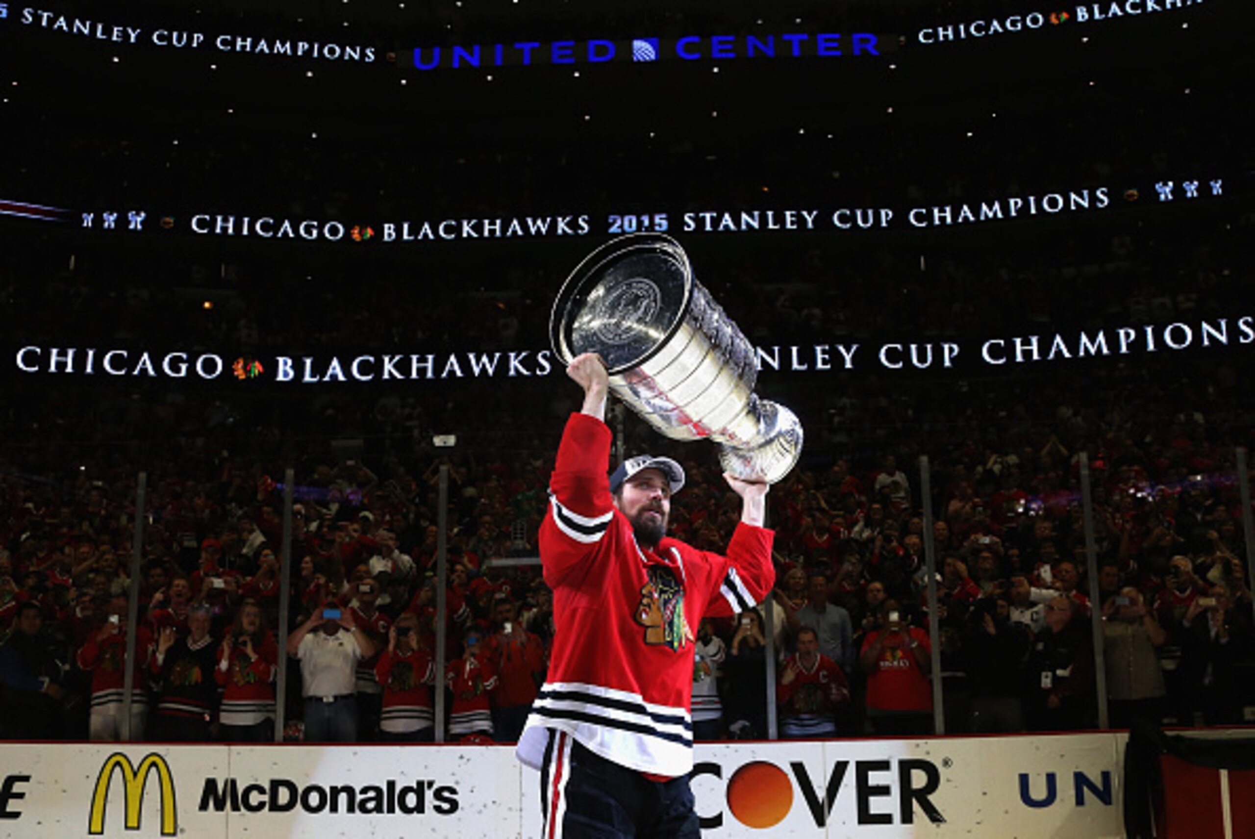 CHICAGO, IL - JUNE 15:  Patrick Sharp #10 of the Chicago Blackhawks hoists the Stanley Cup in celebration after his team defeated the Tampa Bay Lightning 2-0 in Game Six of the 2015 NHL Stanley Cup Final at the United Center on June 15, 2015 in Chicago, I