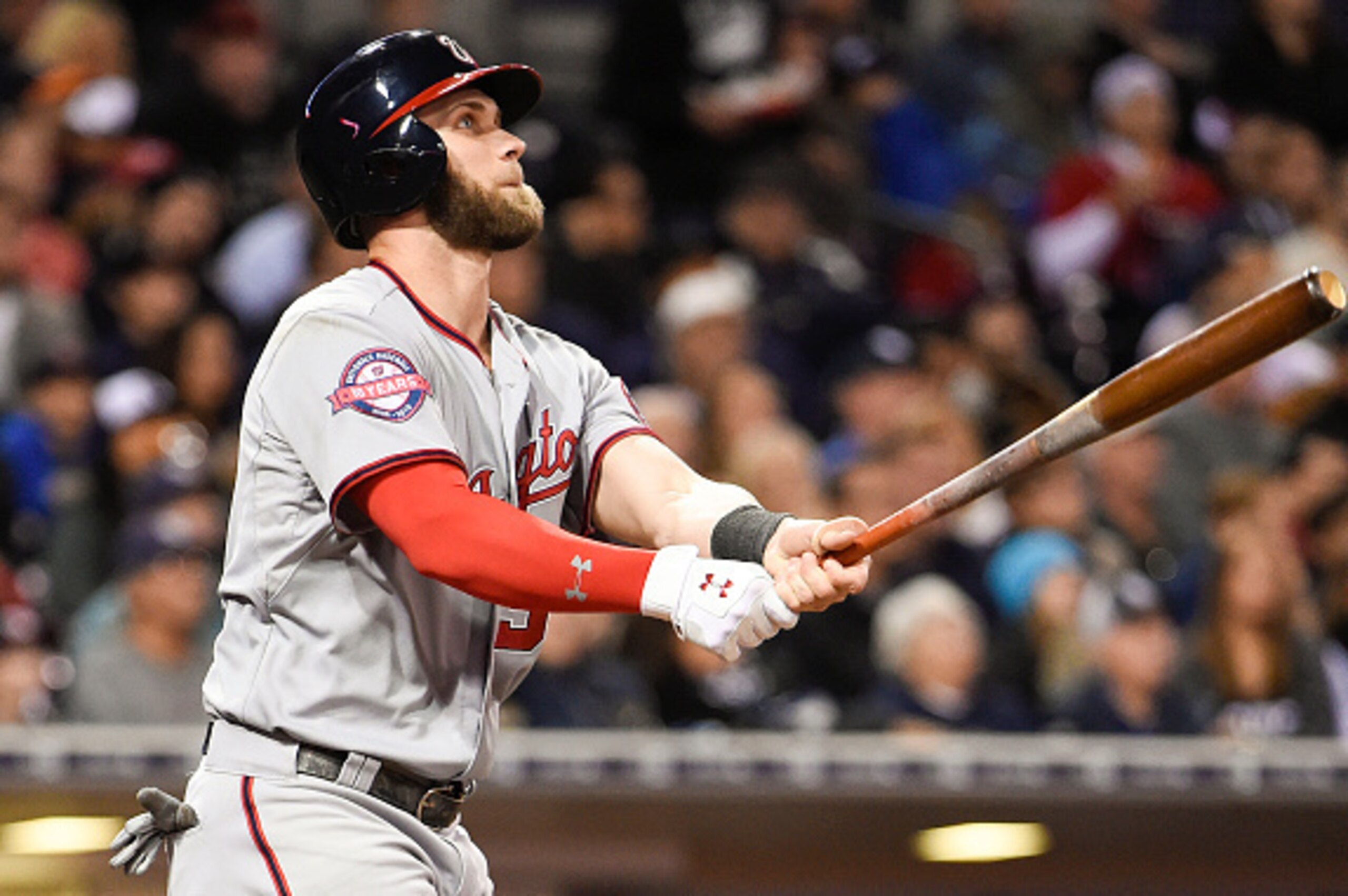 SAN DIEGO, CA - MAY 15:  Bryce Harper #34 of the Washington Nationals hits a solo home run during the fourth inning of a baseball game against the San Diego Padres at Petco Park May 15, 2015 in San Diego, California.  (Photo by Denis Poroy/Getty Images)