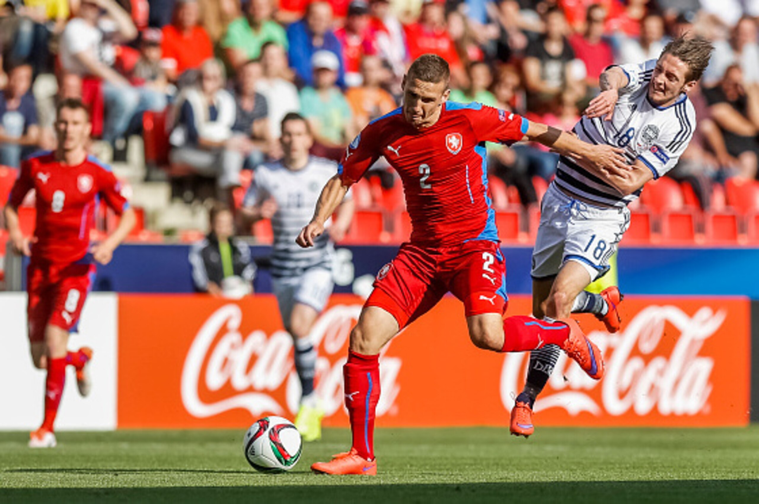 PRAGUE, CZECH REPUBLIC - JUNE 17:  Pavel Kaderabek (L) of Czech Republic battles for the ball with Rasmus Falk (R) of Denmark during UEFA U21 European Championship Group A match between Czech Republic and Denmark at Eden Stadium on June 17, 2015 in Prague