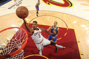 CLEVELAND, OH - JUNE 16: J.R. Smith #5 of the Cleveland Cavaliers shoots during Game Six of the 2015 NBA Finals at The Quicken Loans Arena on June 16, 2015 in Cleveland, Ohio. NOTE TO USER: User expressly acknowledges and agrees that, by downloading and/o