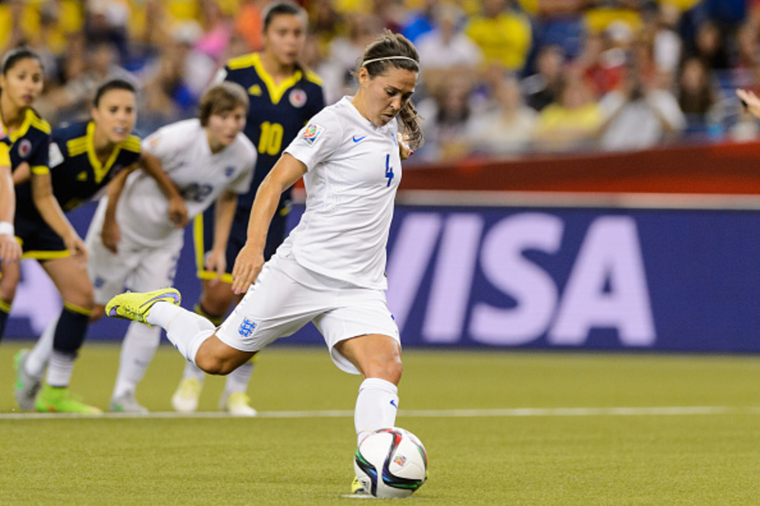 MONTREAL, QC - JUNE 17:  Fara Williams #4 of England kicks the ball on a penalty shot and scores during the 2015 FIFA Women's World Cup Group F match against Colombia at Olympic Stadium on June 17, 2015 in Montreal, Quebec, Canada.  (Photo by Minas Panagi