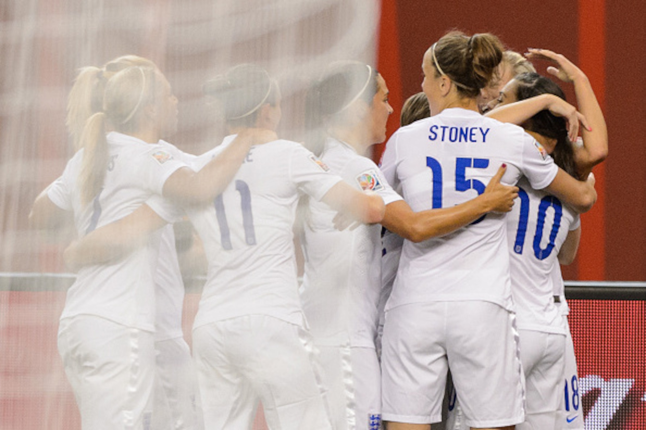 MONTREAL, QC - JUNE 17:  Karen Carney #10 of England celebrates her goal with teammates during the 2015 FIFA Women's World Cup Group F match against Colombia at Olympic Stadium on June 17, 2015 in Montreal, Quebec, Canada.  (Photo by Minas Panagiotakis/Ge
