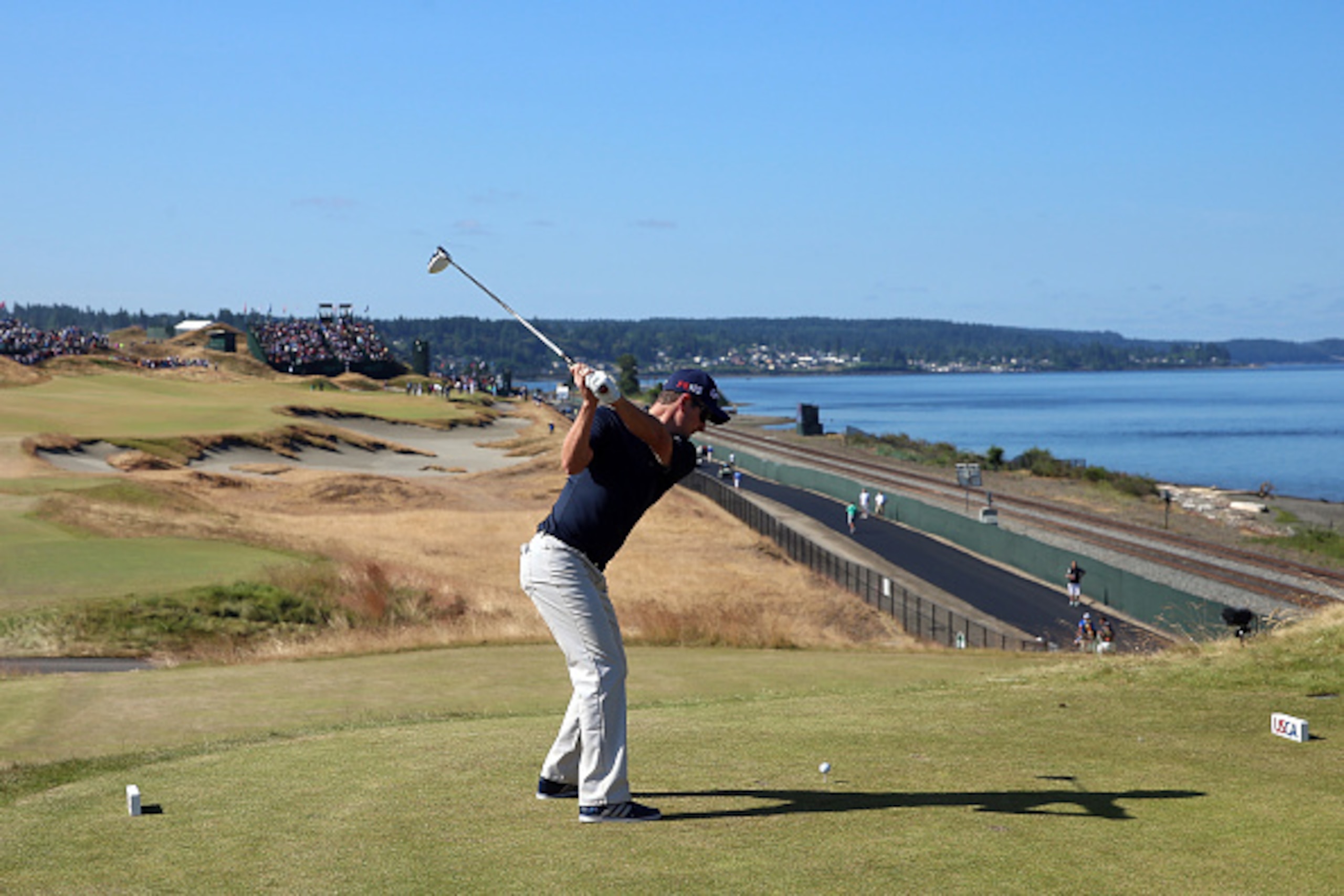 UNIVERSITY PLACE, WA - JUNE 17:  Justin Rose of England hits a tee shot during a practice round prior to the start of the 115th U.S. Open Championship at Chambers Bay on June 17, 2015 in University Place, Washington.  (Photo by Andrew Redington/Getty Imag