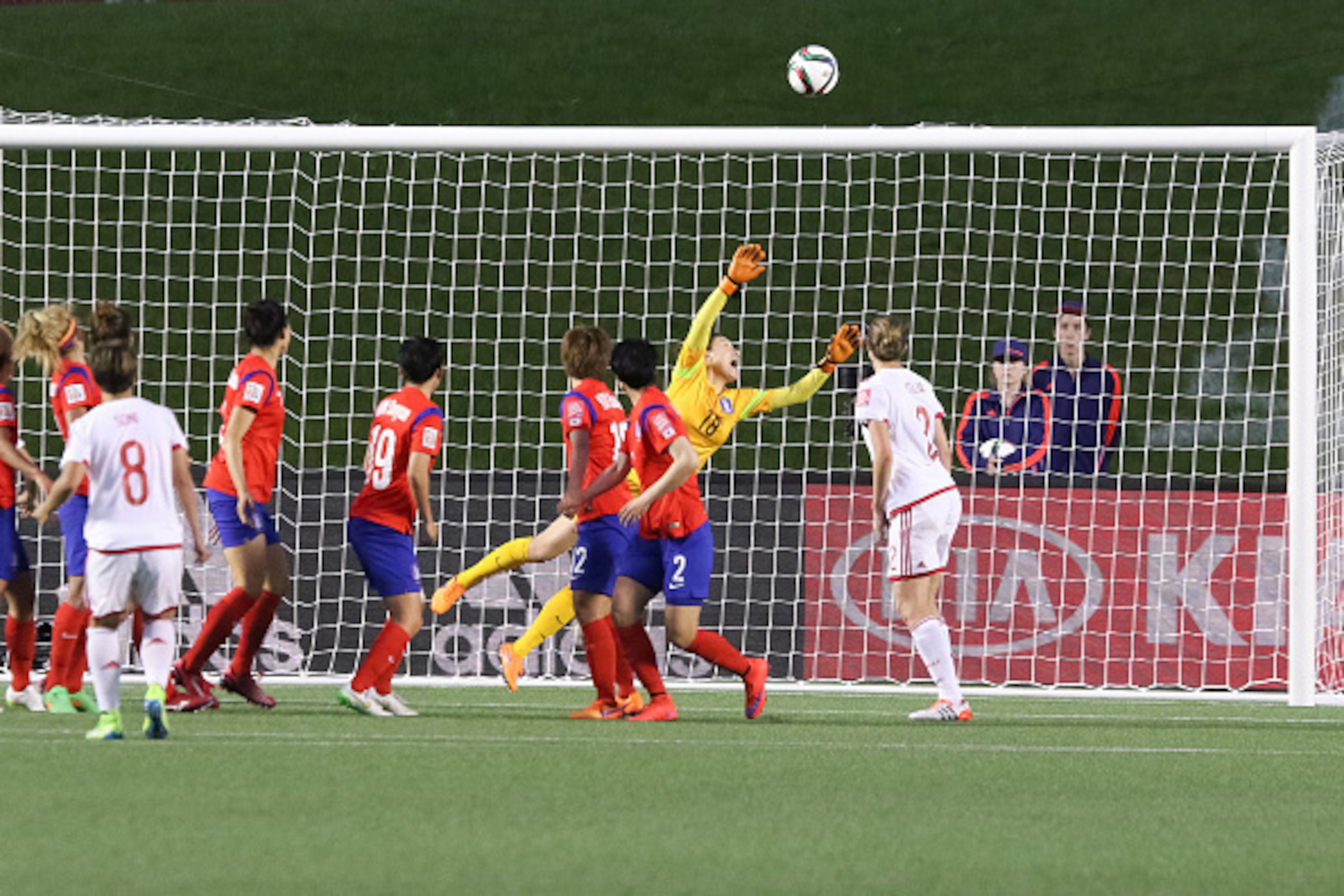 OTTAWA, ON - JUNE 17: Jungmi Kim #18 of Korea Republic reaches for the ball as it hits the crossbar off a free kick by Sonia Bermudez #8 of Spain in extra time during the FIFA Women's World Cup Canada 2015 Group E match between Korea Republic and Spain at