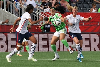 OTTAWA, ON - JUNE 17: Renae Cuellar #19 of Mexico battles for the ball against Amandine Henry #6 of France during the FIFA Women's World Cup Canada 2015 Group F match between Mexico and France at Lansdowne Stadium on June 17, 2015 in Ottawa, Canada.  (Pho