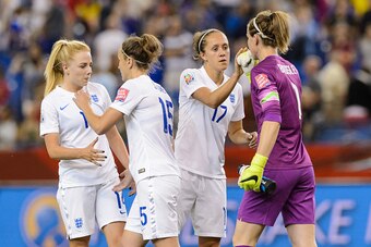 MONTREAL, QC - JUNE 17: England celebrate their victory over Colombia during the 2015 FIFA Women's World Cup Group F match at Olympic Stadium on June 17, 2015 in Montreal, Quebec, Canada. England defeated Colombia 2-1. (Photo by Minas Panagiotakis/Getty I