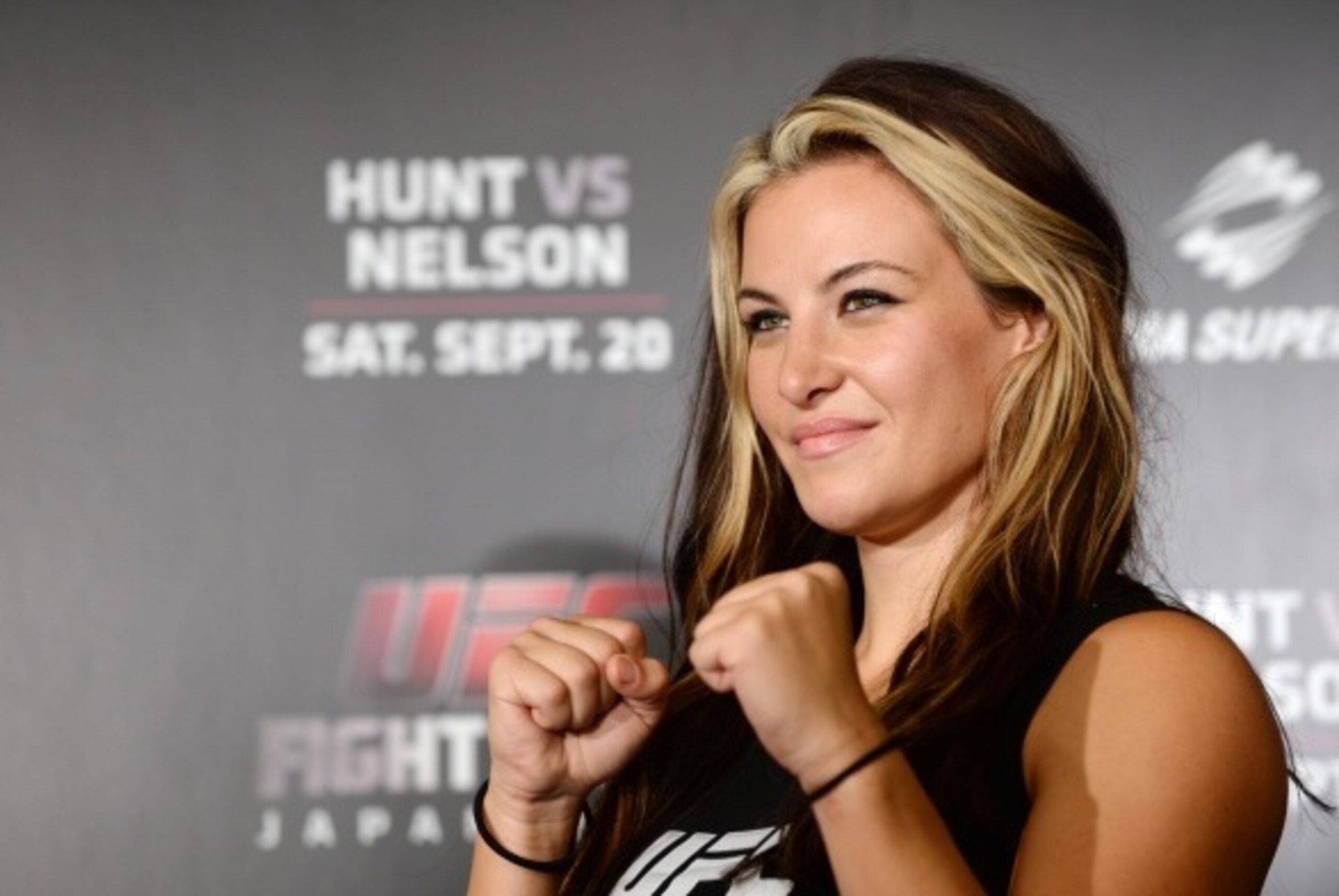 TOKYO, JAPAN - AUGUST 26:  Miesha Tate, UFC women's bantaweight poses for a photograph during a UFC press conference at Akasaka Garden City on August 26, 2014 in Tokyo, Japan.  (Photo by Atsushi Tomura/Getty Images)