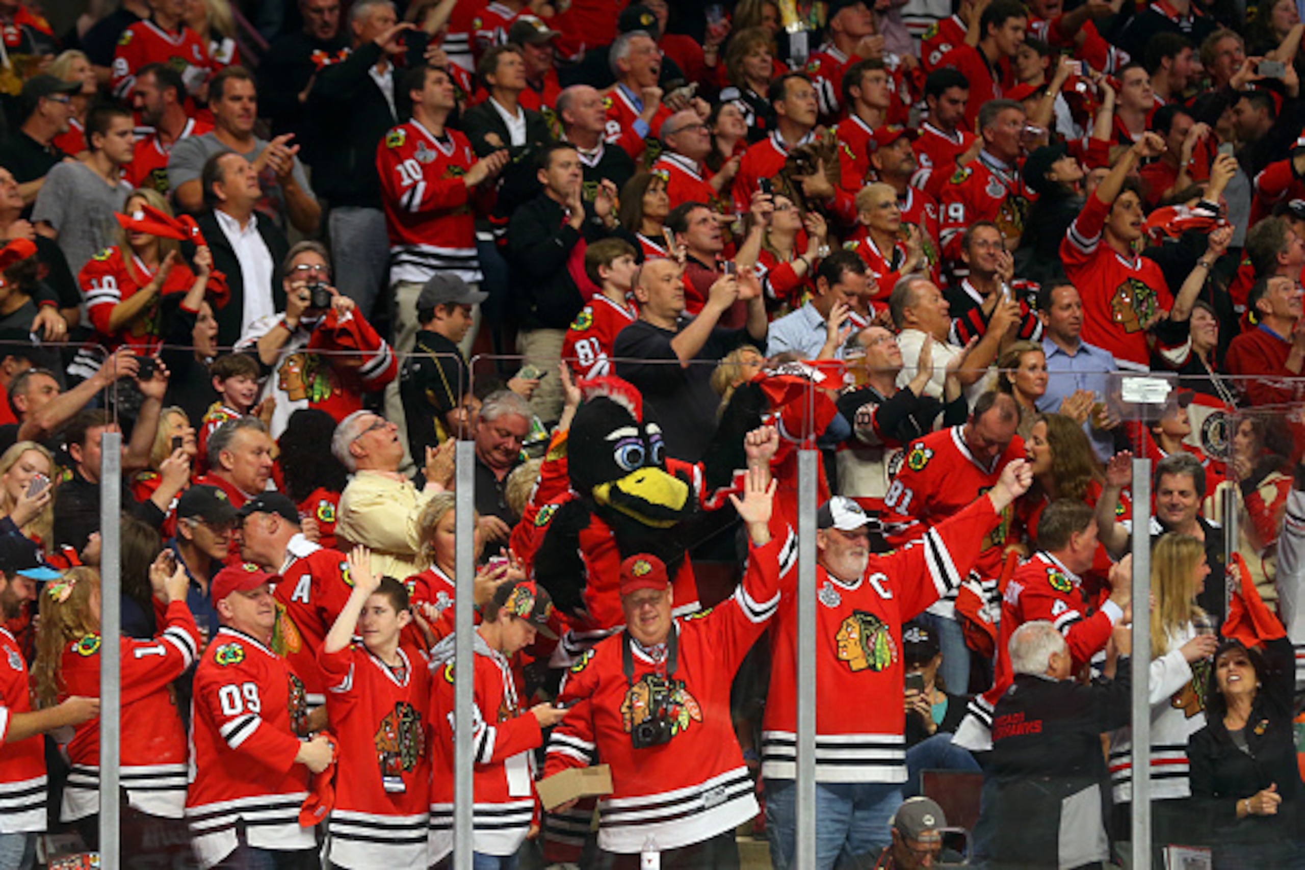 CHICAGO, IL - JUNE 15:  Chicago Blackhawks fans celebrate Brandon Saad #20 of the Chicago Blackhawks second period goal against Ben Bishop #30 of the Tampa Bay Lightning during Game Six of the 2015 NHL Stanley Cup Final at the United Center  on June 15, 2