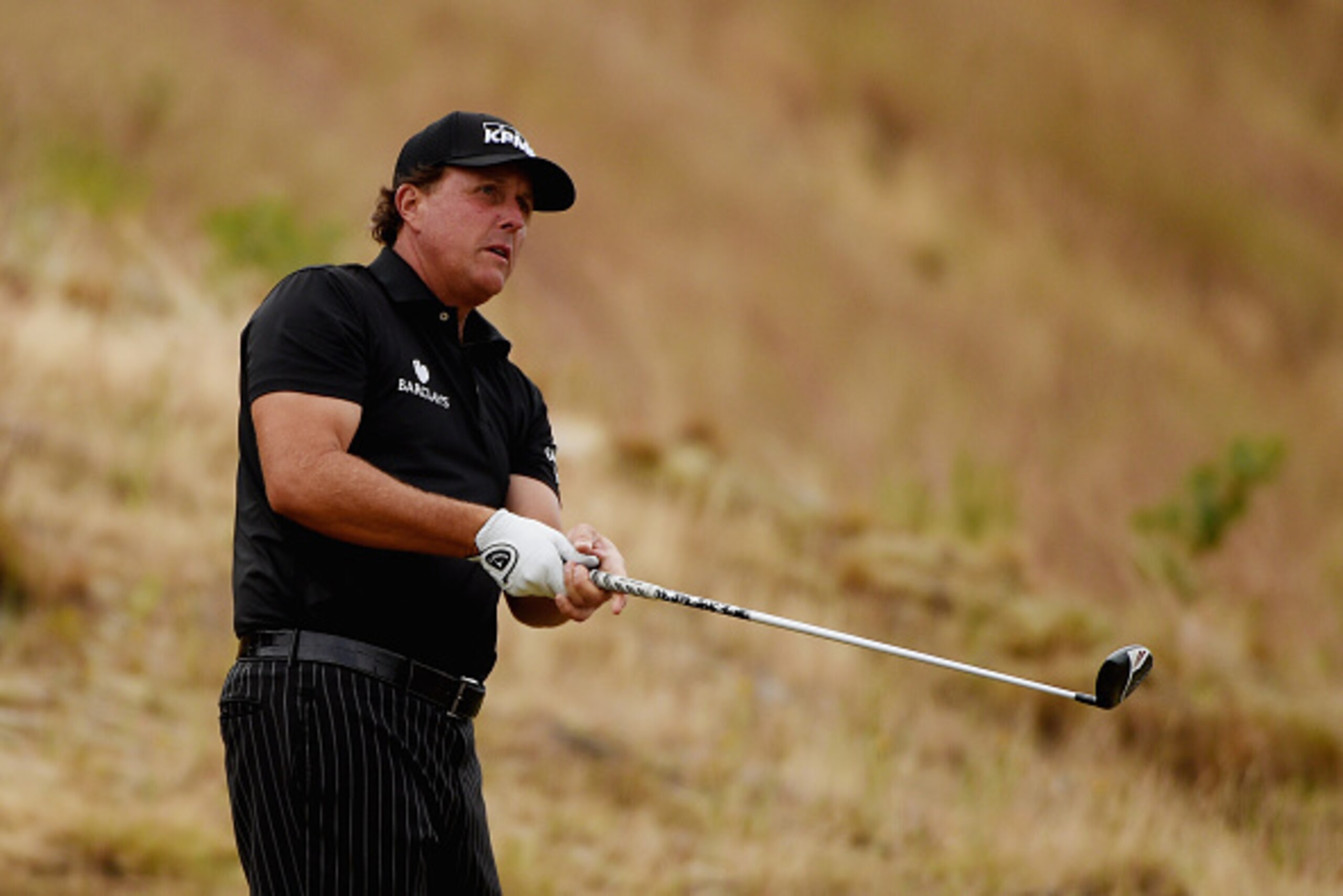 UNIVERSITY PLACE, WA - JUNE 16:  Phil Mickelson of the United States watches a shot during a practice round prior to the start of the 115th U.S. Open Championship at Chambers Bay on June 16, 2015 in University Place, Washington.  (Photo by Ross Kinnaird/G