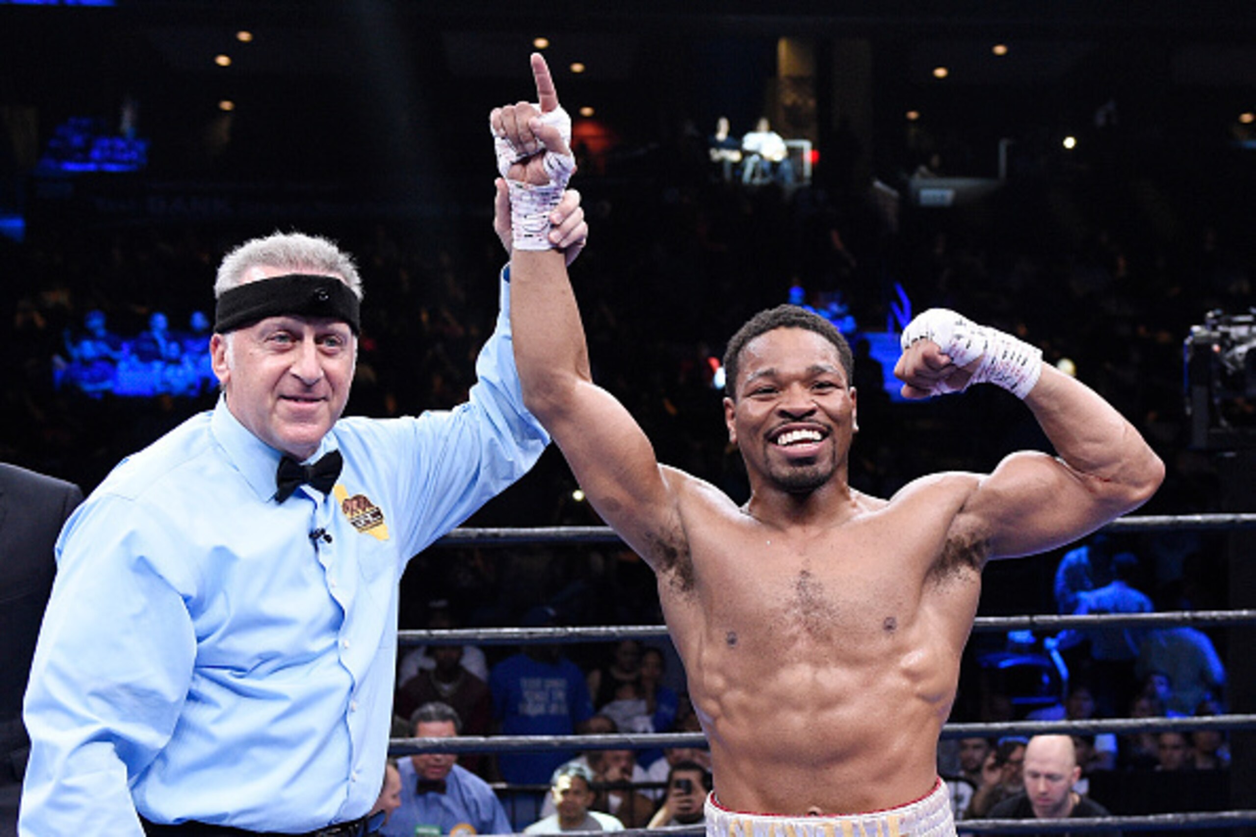 ONTARIO, CA - MARCH 13:  Referee Jack Reiss (L) raises the arm of Shawn Porter after defeating Erick Bone during their 12 round welterweight bout at Citizens Business Bank Arena March 13, 2015 in Ontario, California. (Photo by Kevork Djansezian/Getty Imag
